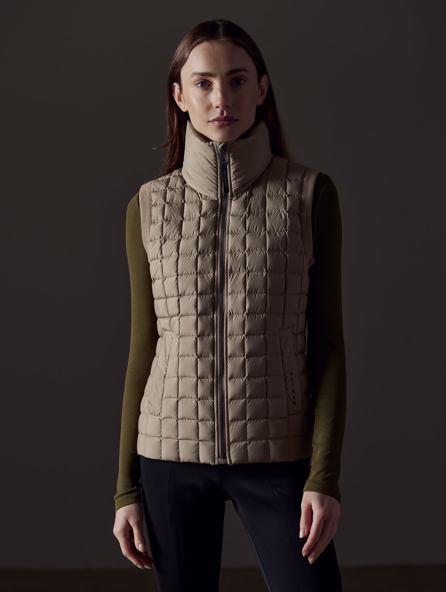 woman wearing brown vest from AETHER Apparel