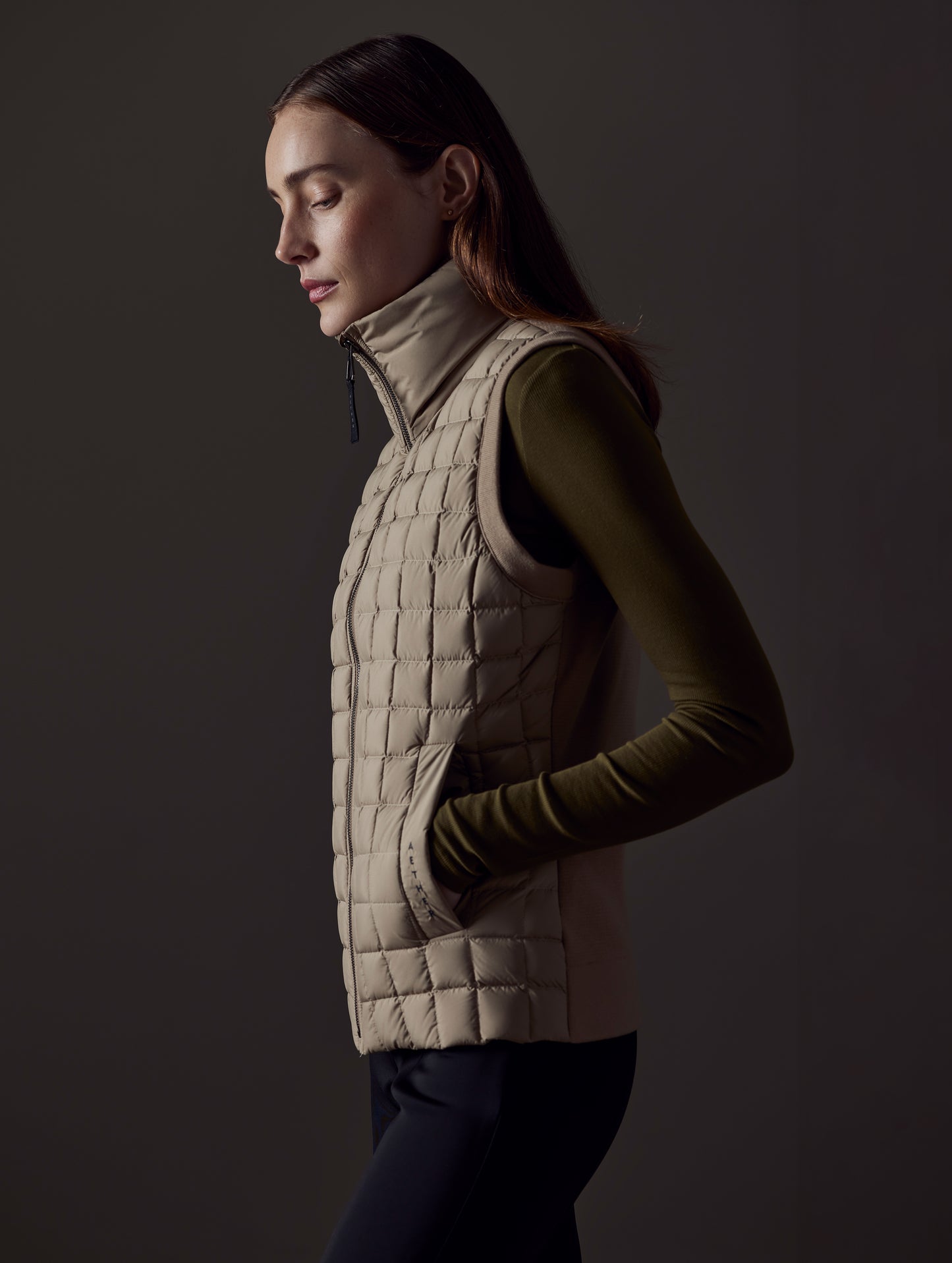 woman wearing brown vest from AETHER Apparel
