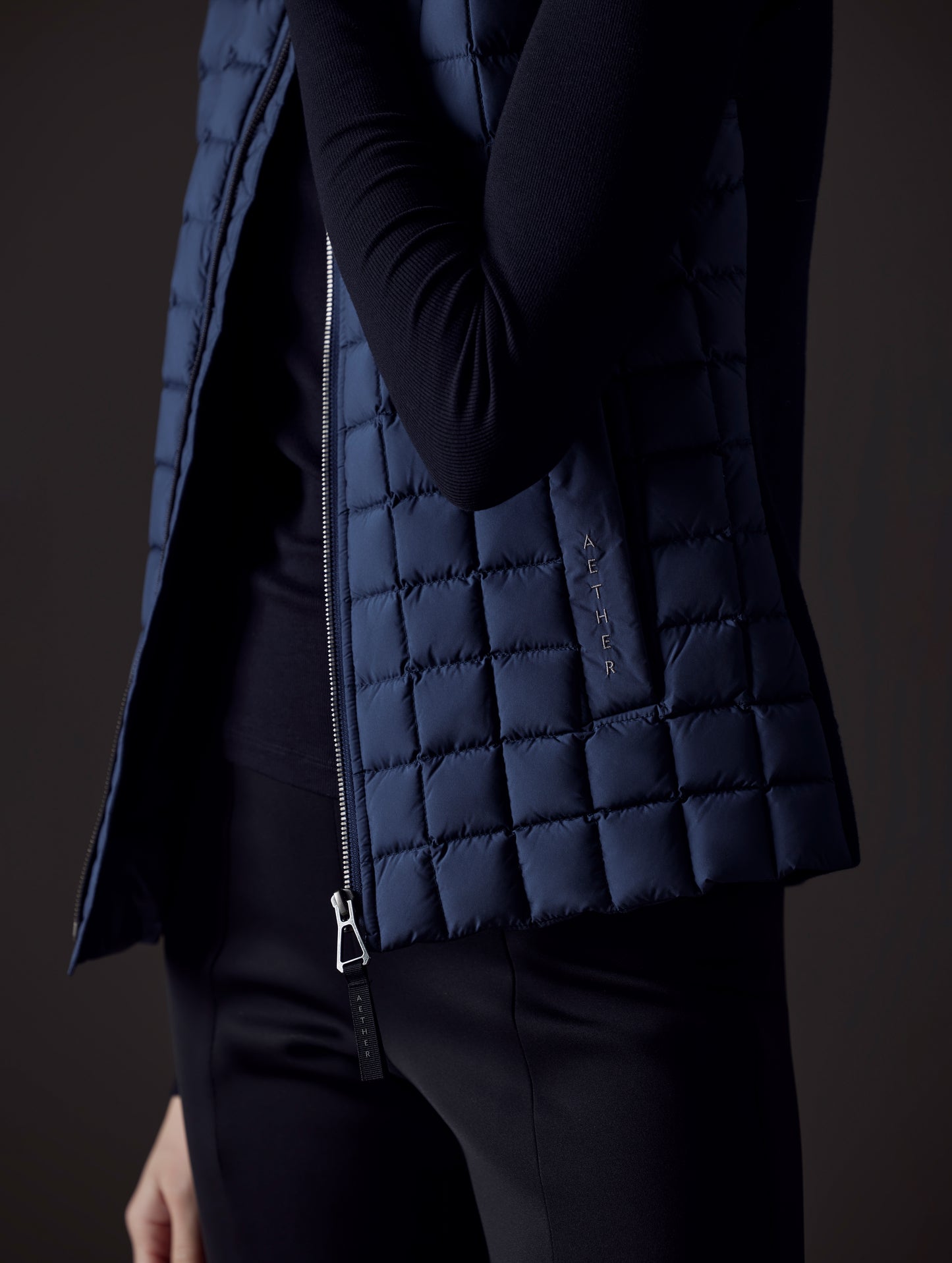 women's blue insulated vest from AETHER Apparel