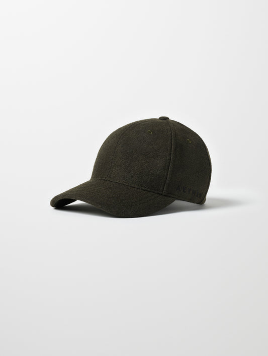 Front angled view of AETHER Wool Hat in Dark Command Green from AETHER Apparel.
