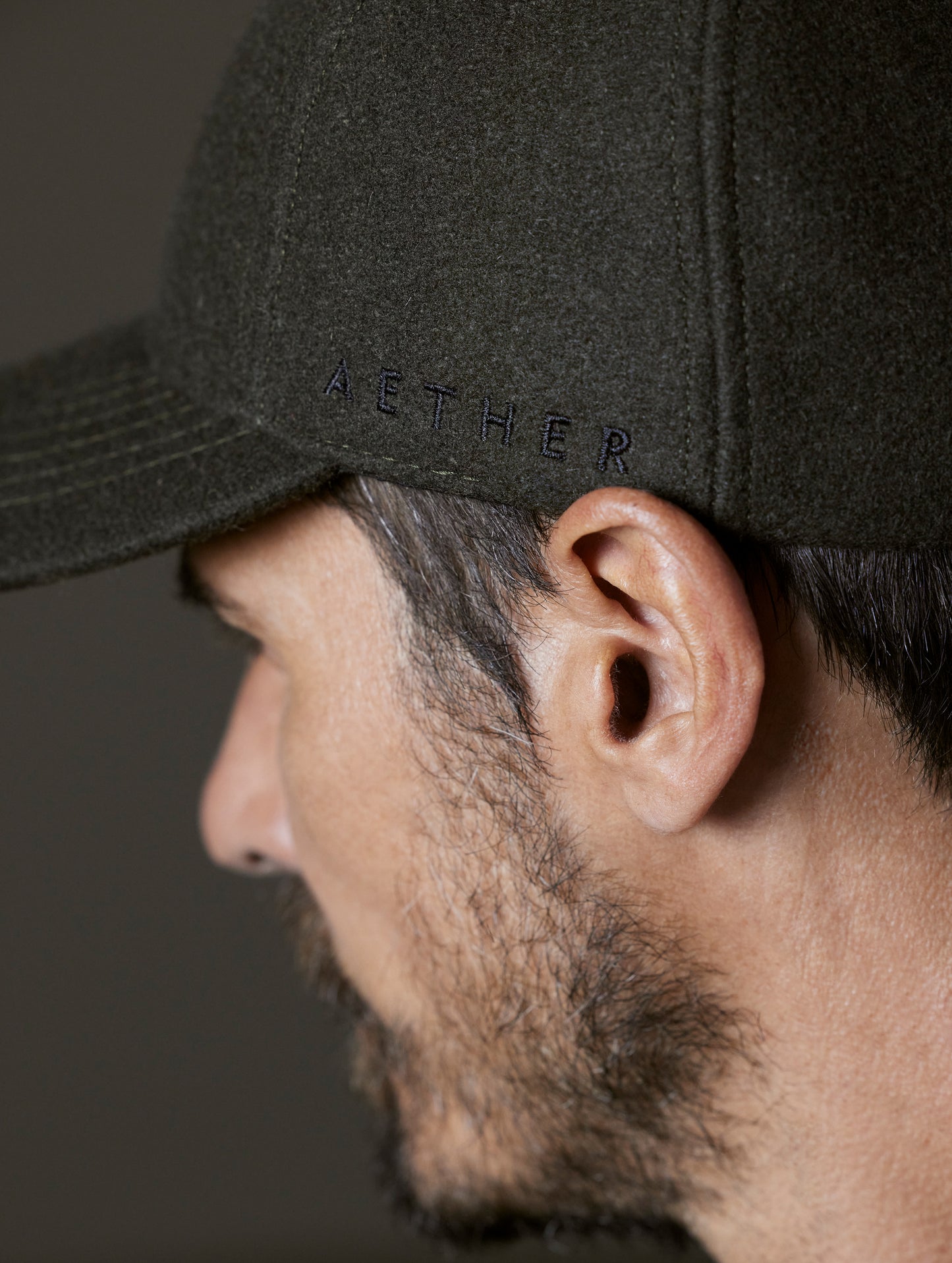 Closeup detailed view of wool construction of AETHER Wool Hat in Dark Command Green from AETHER Apparel.