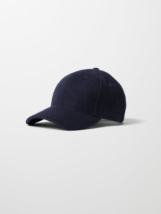 Front angled view of AETHER Wool Hat in Total Eclipse dark blue from AETHER Apparel.