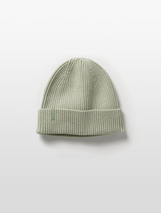 Flat lay of Chalet Cotton Beanie in Mineral Green Heather from AETHER Apparel.