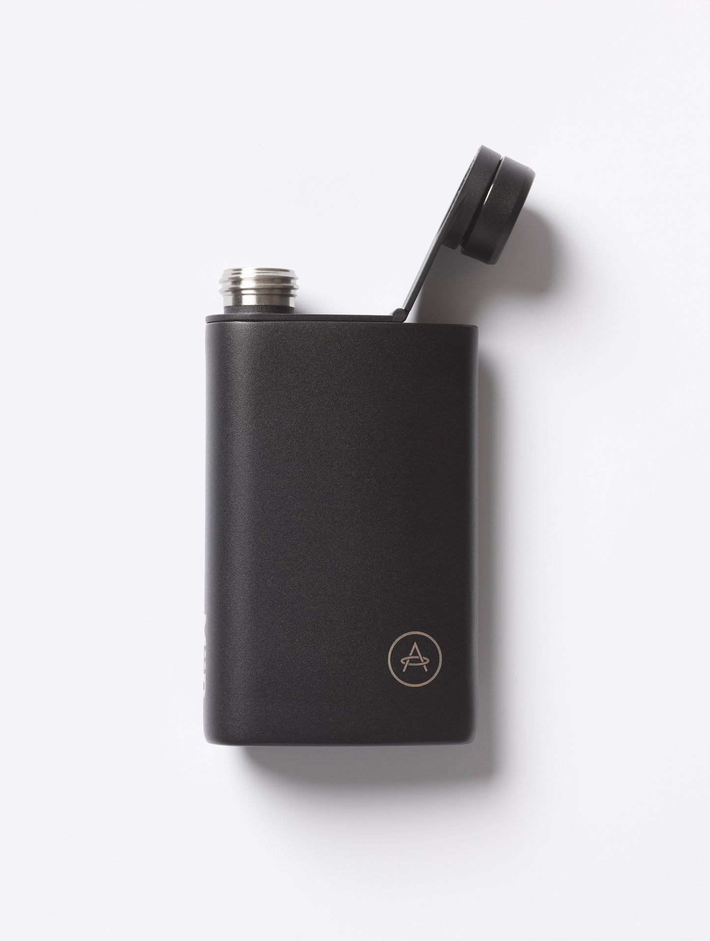 Flat lay view of front side of AETHER + Miir Aero Flask in Black with top open.