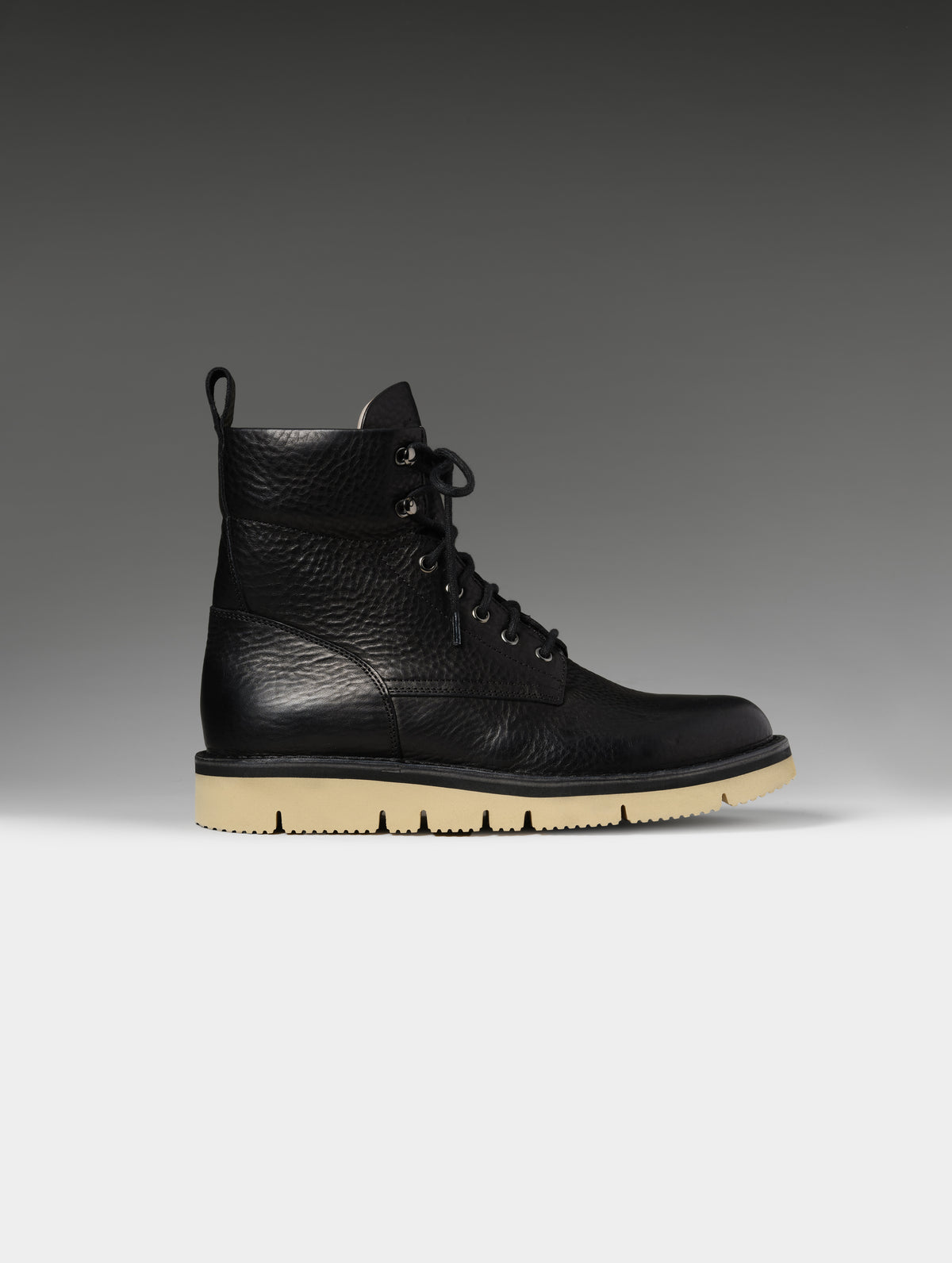 Side profile studio shot of the Canyon Boot in Onyx Black with black laces from AETHER Apparel.