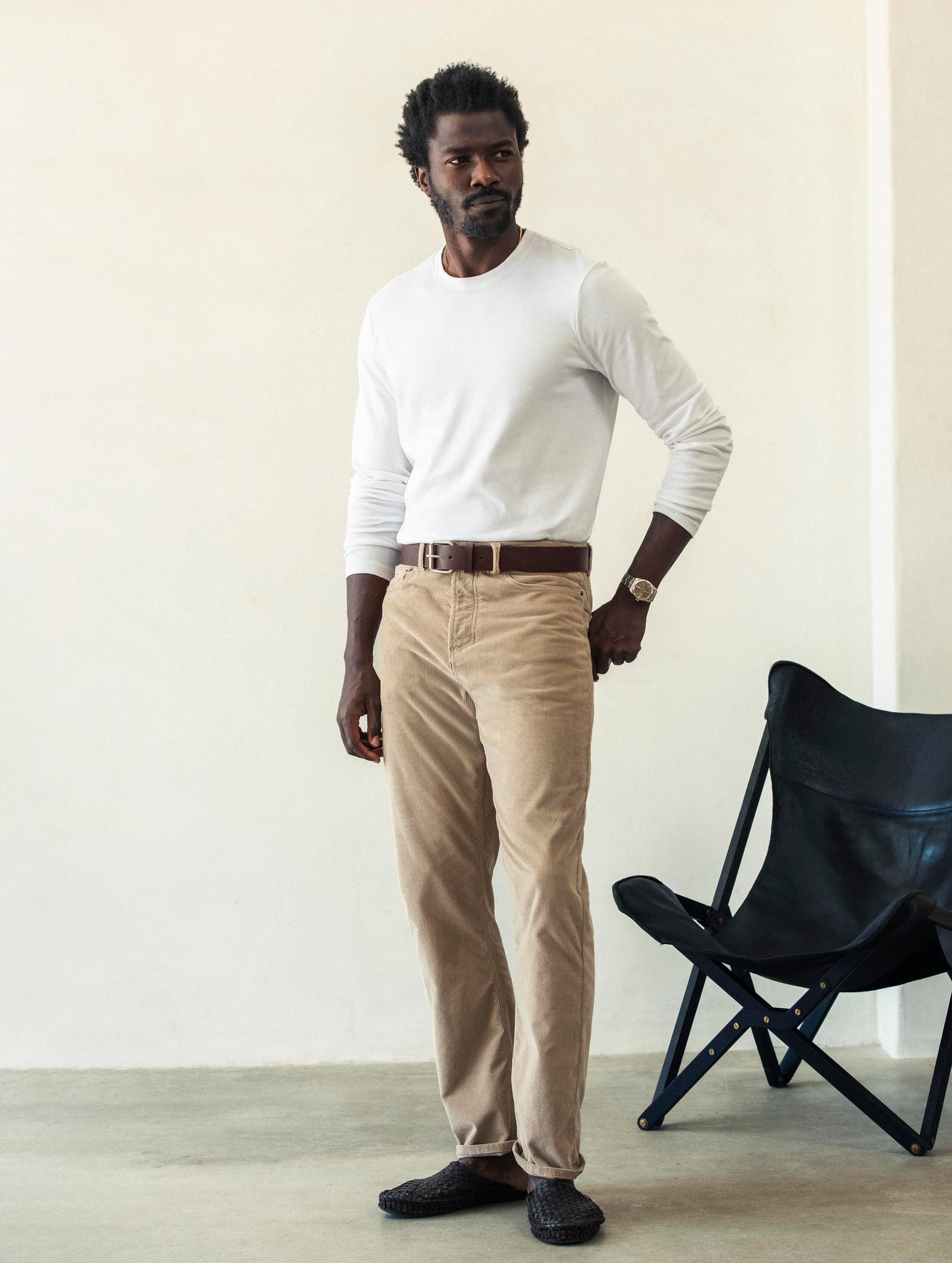 man wearing brown leather belt from AETHER Apparel