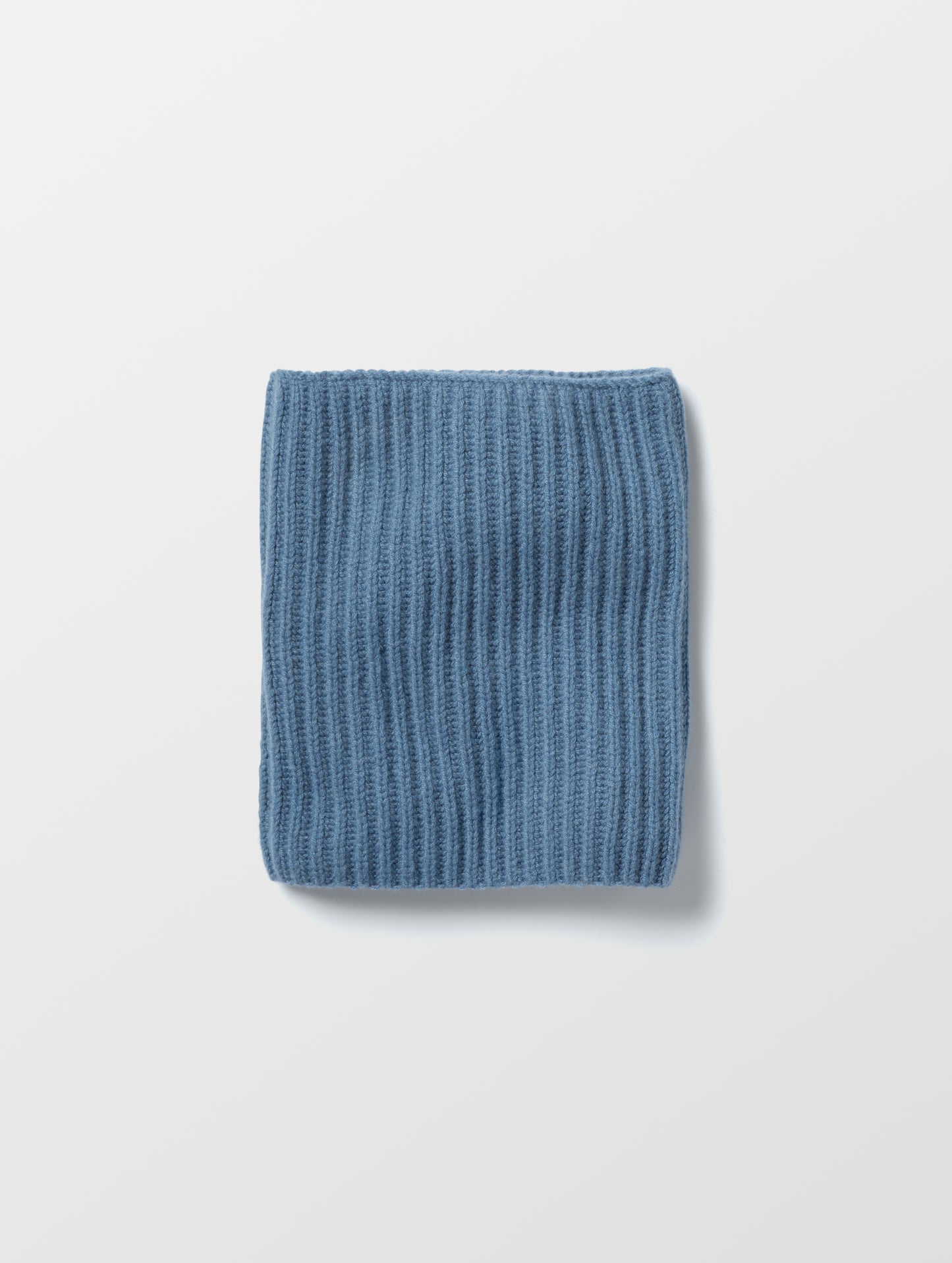 Flat lay of the Cashmere Neck Gaiter in Portal Blue from AETHER Apparel.