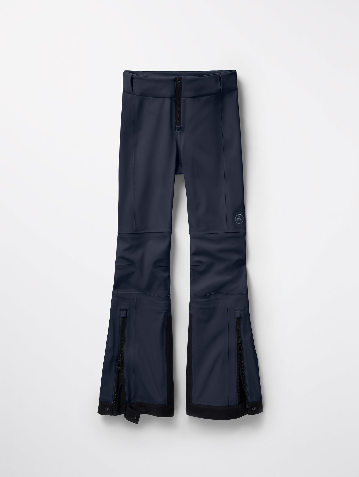 Flat lay of women’s Descent Pant in Total Eclipse dark blue from AETHER Apparel.