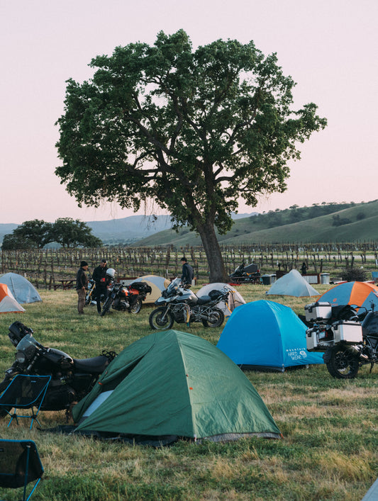 Tents and motorcycles at camping site in Paso Robles, California.