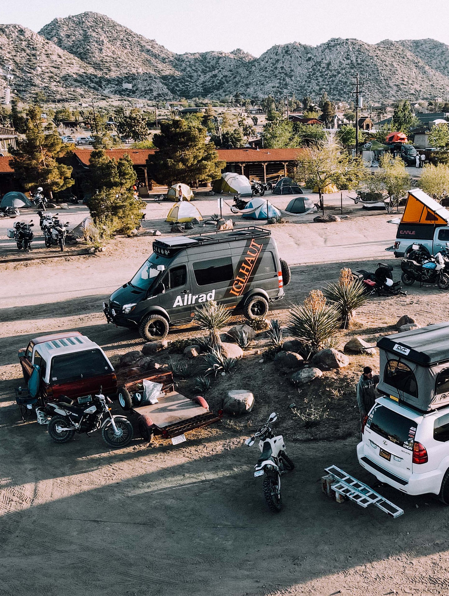 Image of the car and motorcycle camping area at the AETHER Pioneertown Rally.