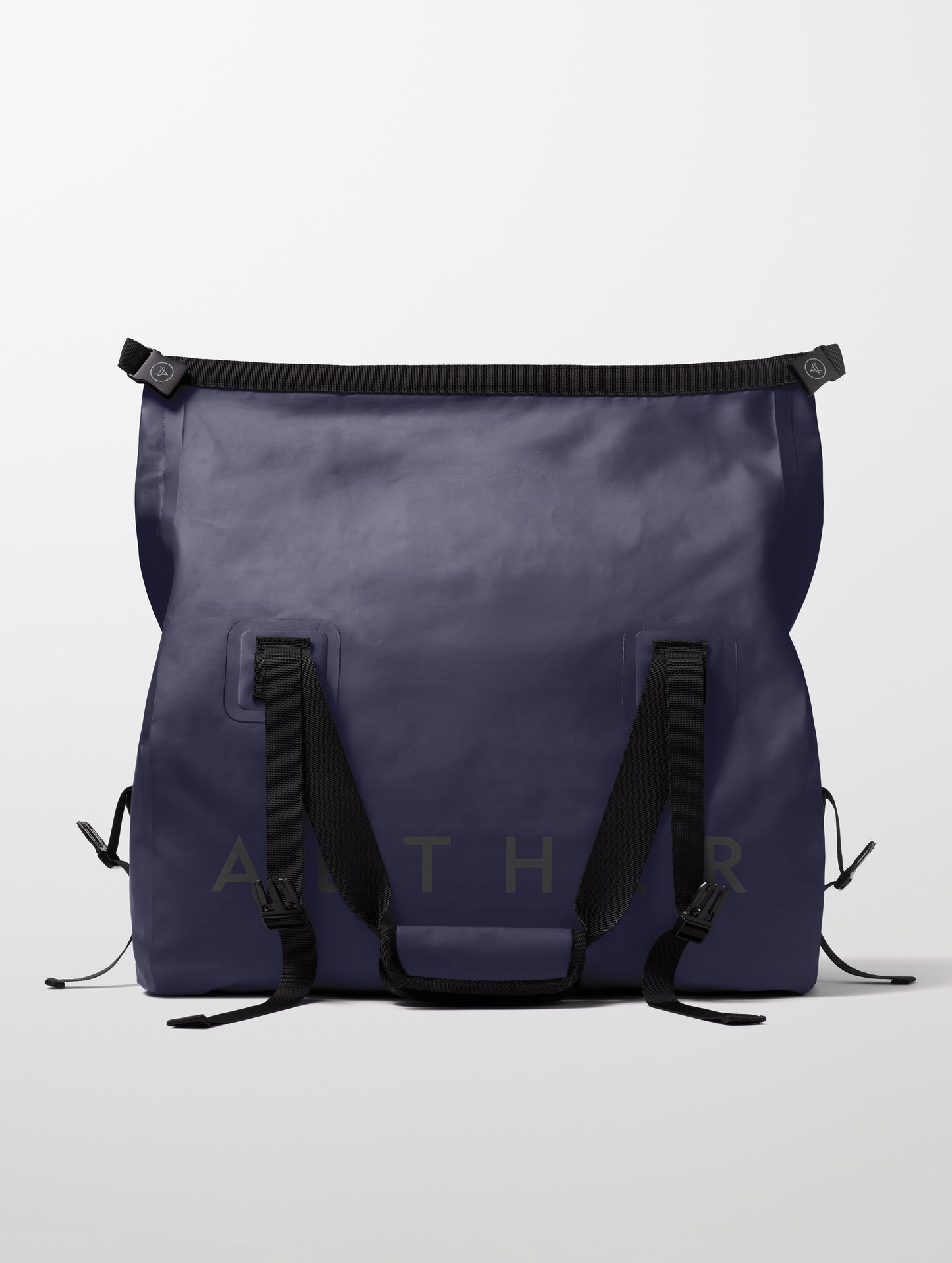 Rear view of unrolled Excursion Duffle Bag 45L in Total Eclipse dark blue from AETHER Apparel.