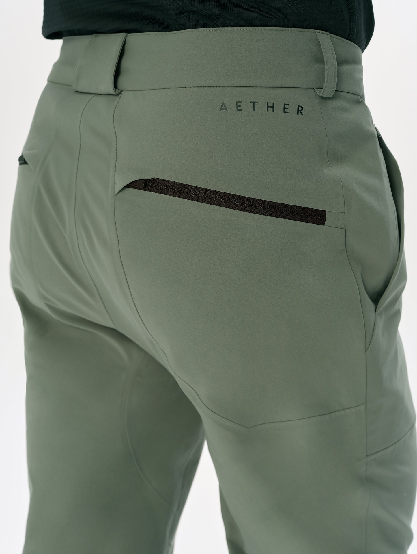 Closeup detailed view of the back pocket on the Frontier Pant in Gunmetal from AETHER Apparel.