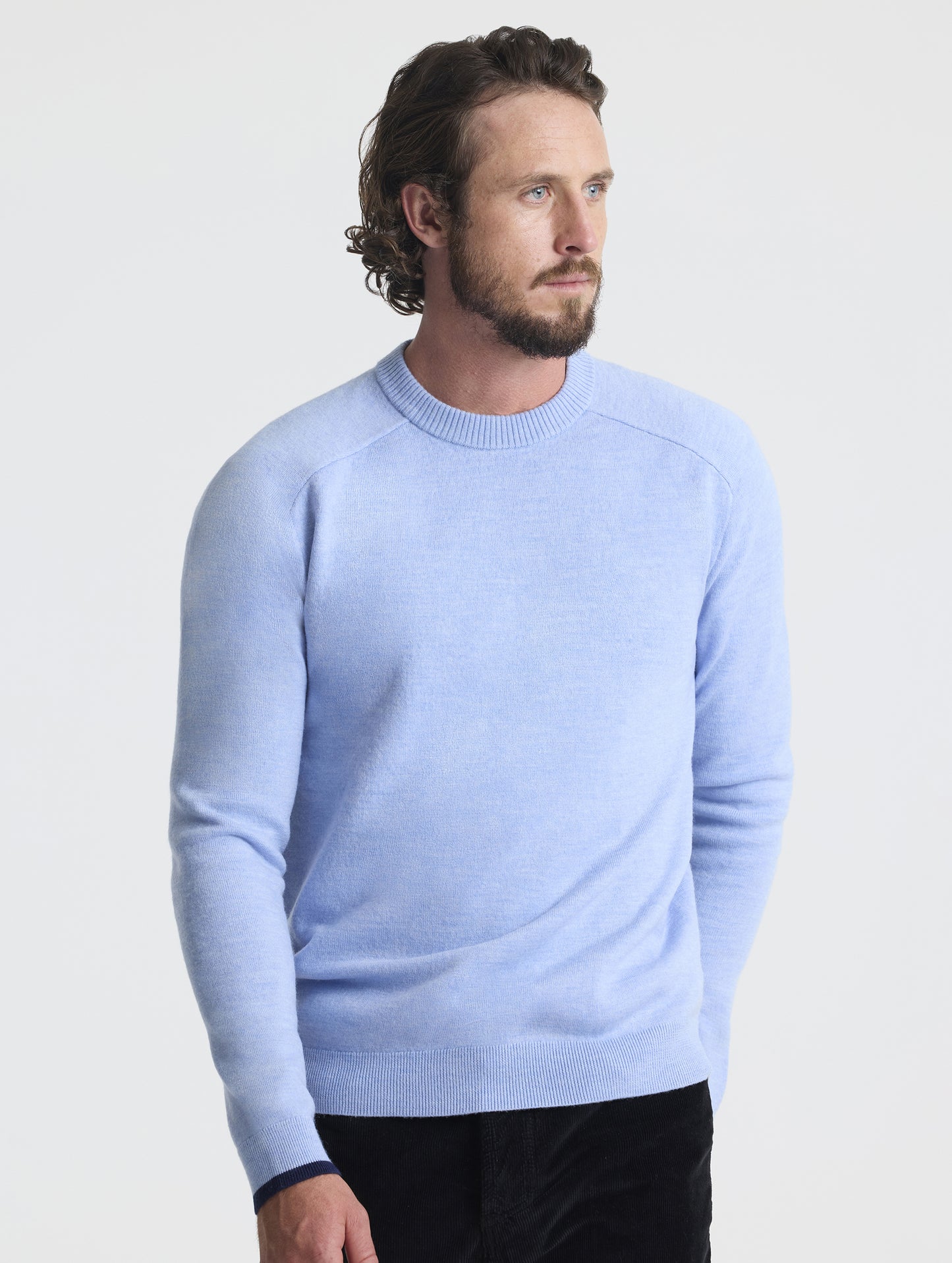 Front view of man wearing Corbin Sweater in Light Blue Heather from AETHER Apparel.