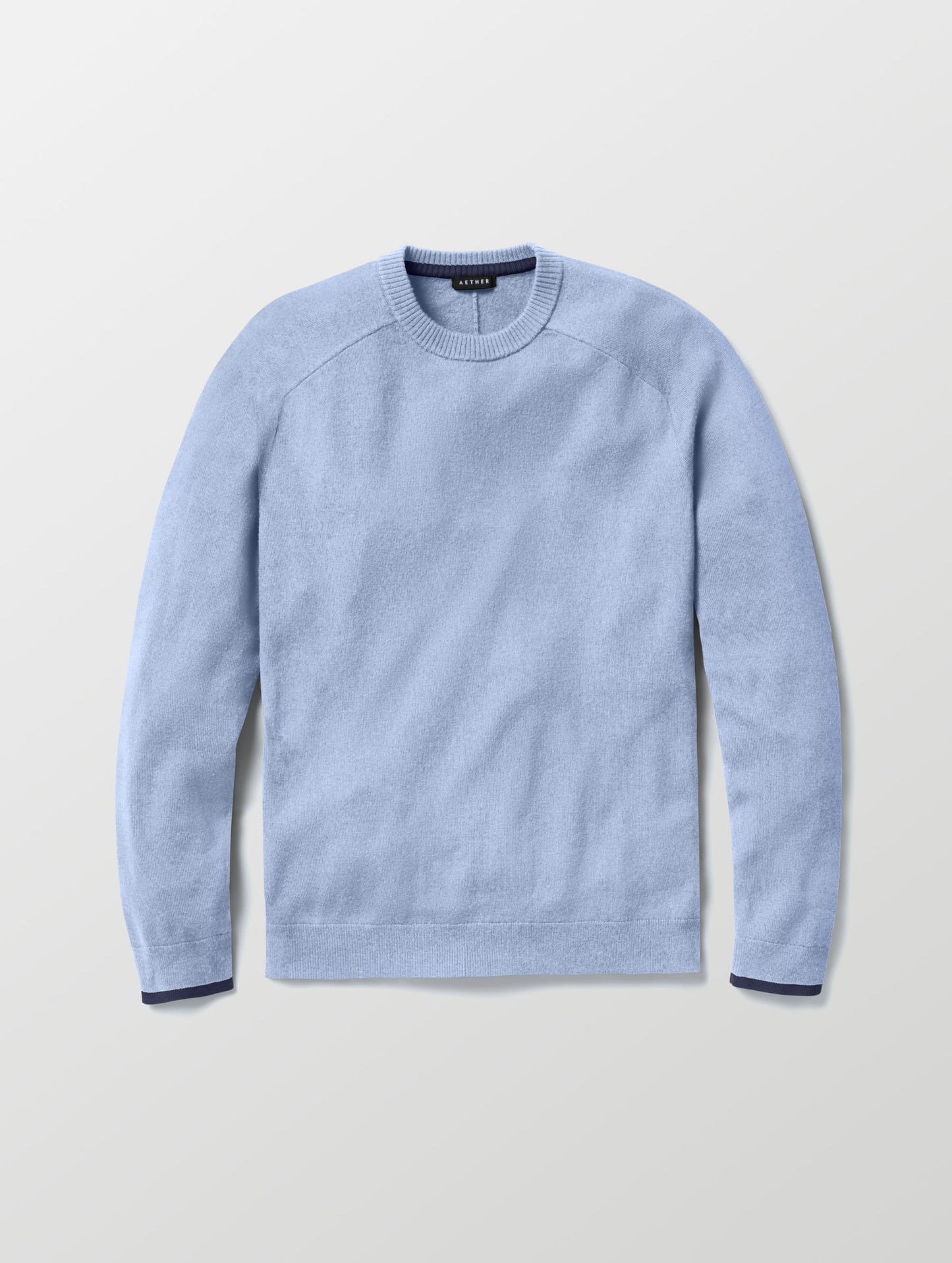 Flat lay of Corbin Sweater in Light Blue Heather from AETHER Apparel.