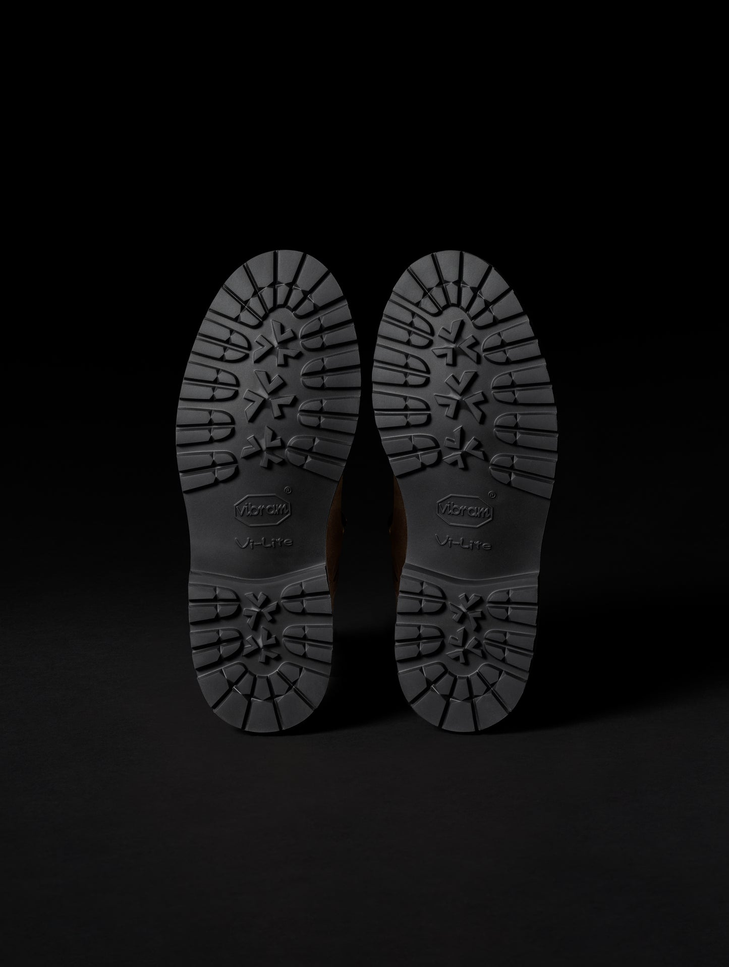 View of bottom of Vibram Vi Lite outsoles on men's Dolomite Boot in Taupe from AETHER Apparel.