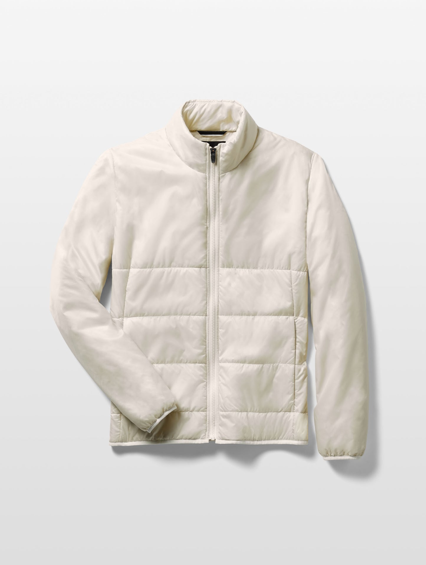 Flat lay of Eco Insulated Jacket in Bone white from AETHER Apparel.