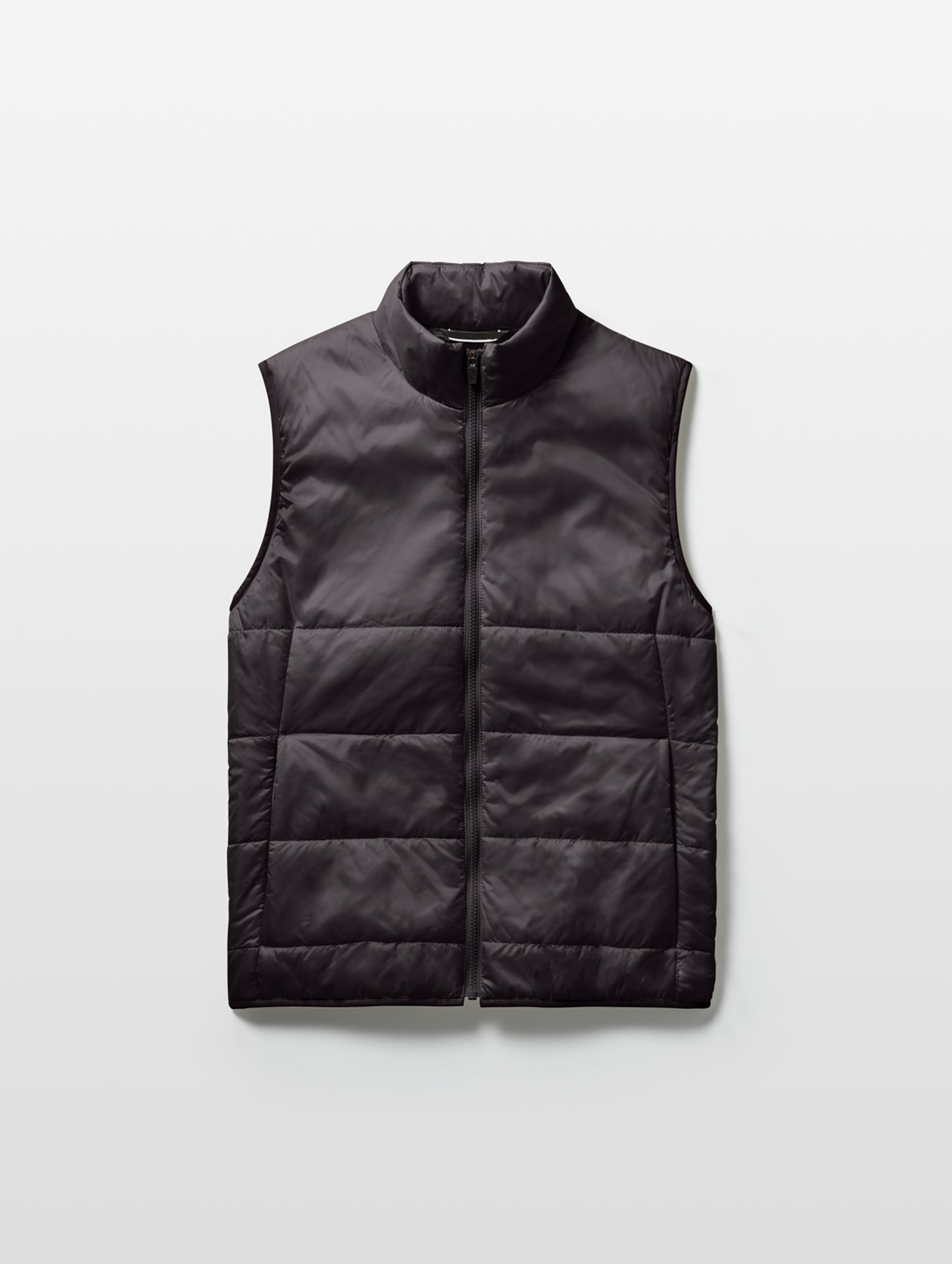 Flat lay of Eco Insulated Vest in Onyx Black from AETHER Apparel.