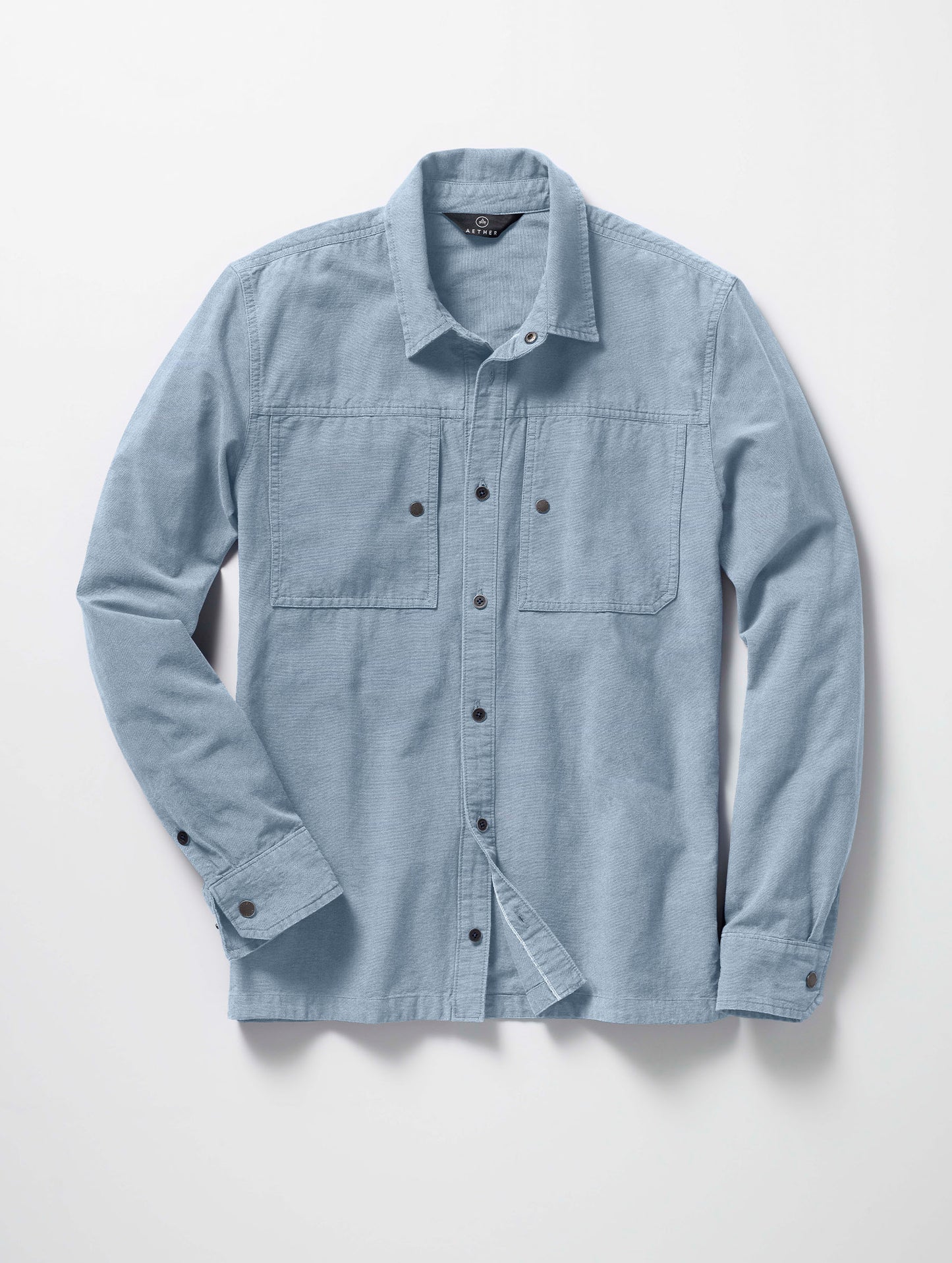 Flay lay of the Emerson Button Down in Light Blue from AETHER Apparel.