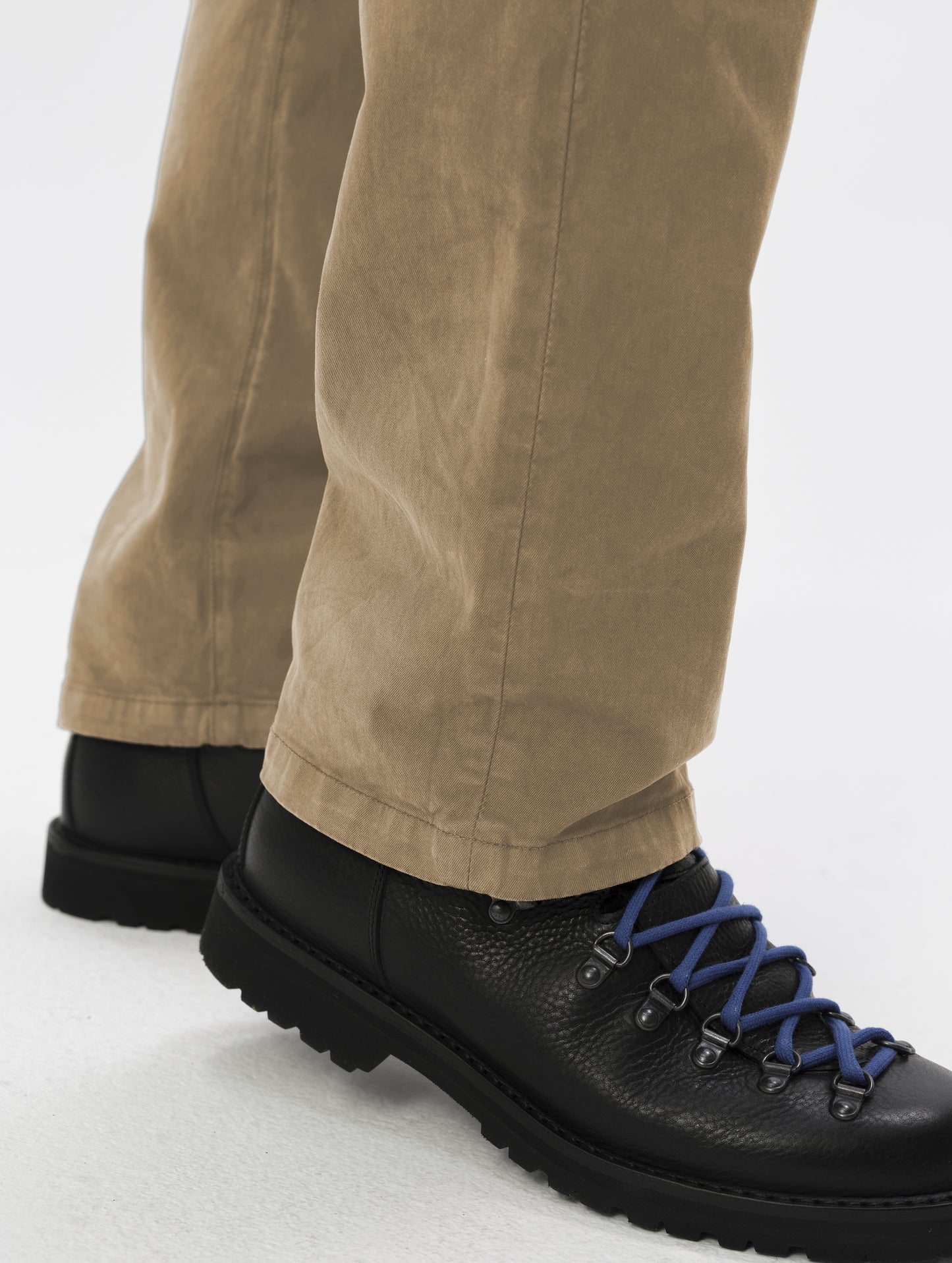 Closeup detailed view of the leg cuffs on the Flint Chino Pant in Desert Tan from AETHER Apparel.