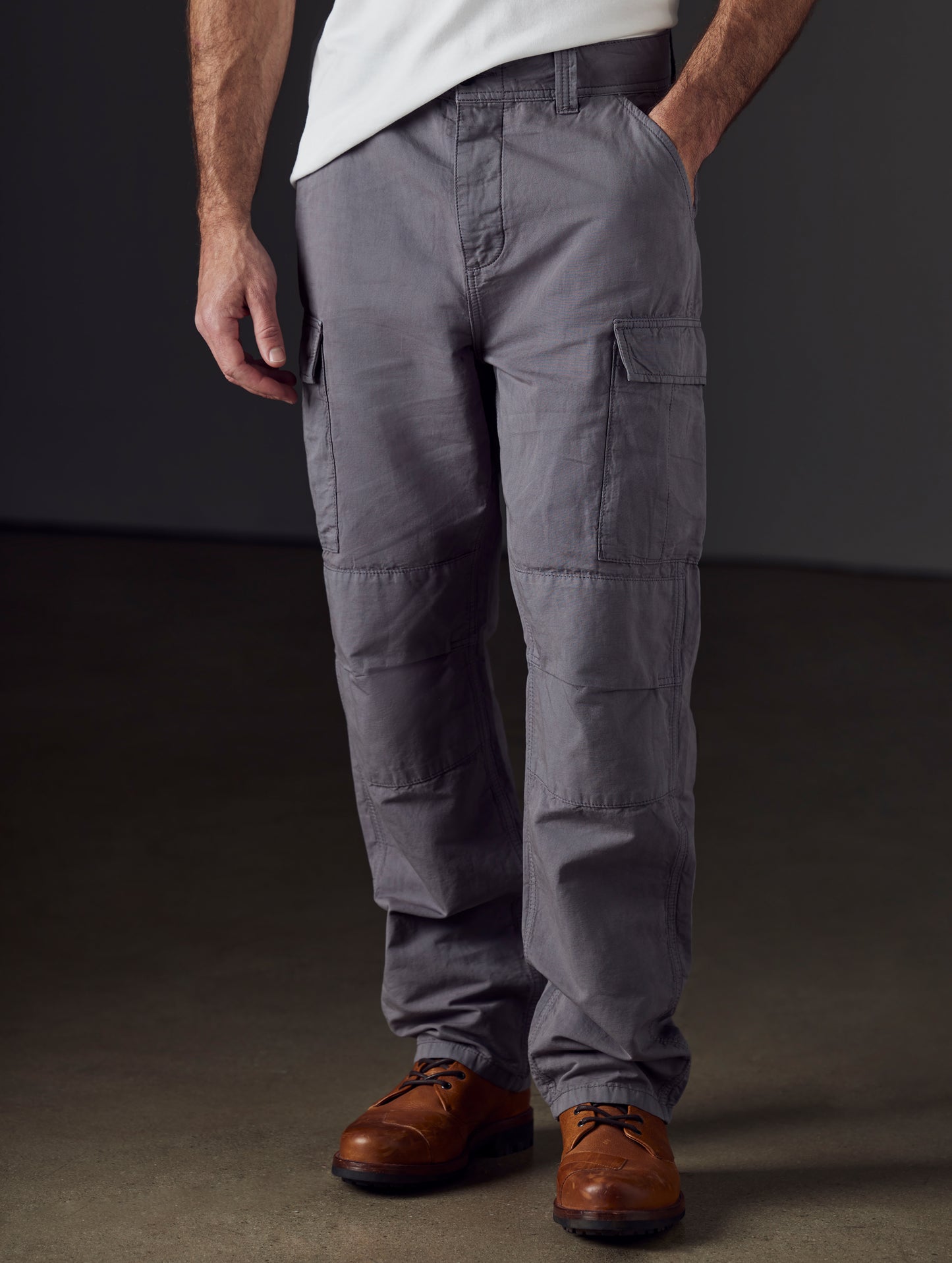 Front lower body view of man wearing Glade Fatigue Pant in Storm grey from AETHER Apparel.