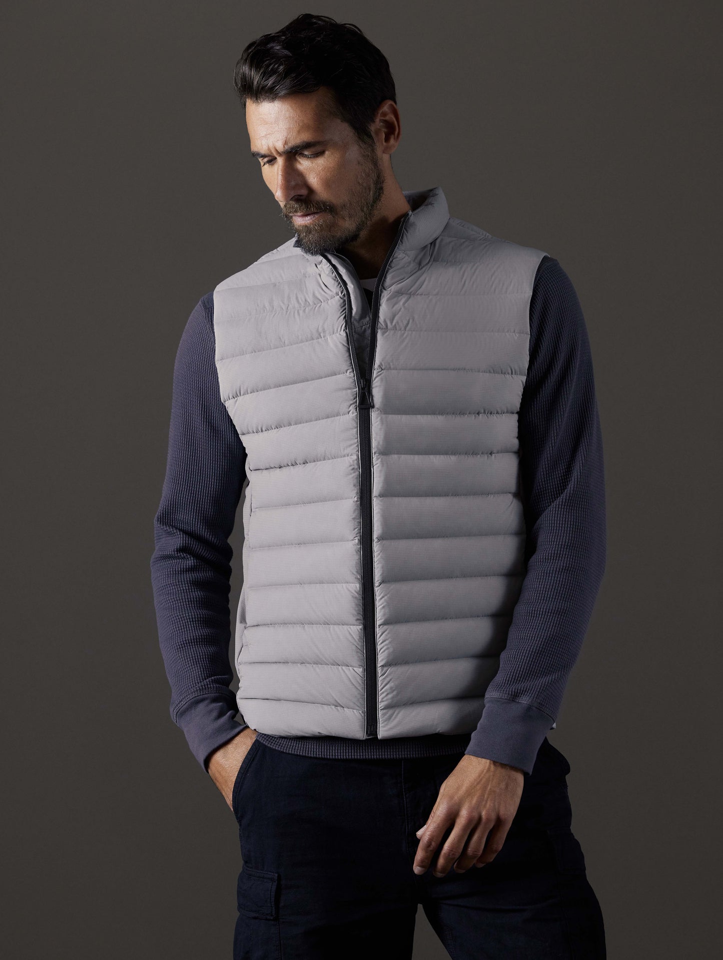 Front body view of man wearing Launch Vest in Sky Grey from AETHER Apparel.