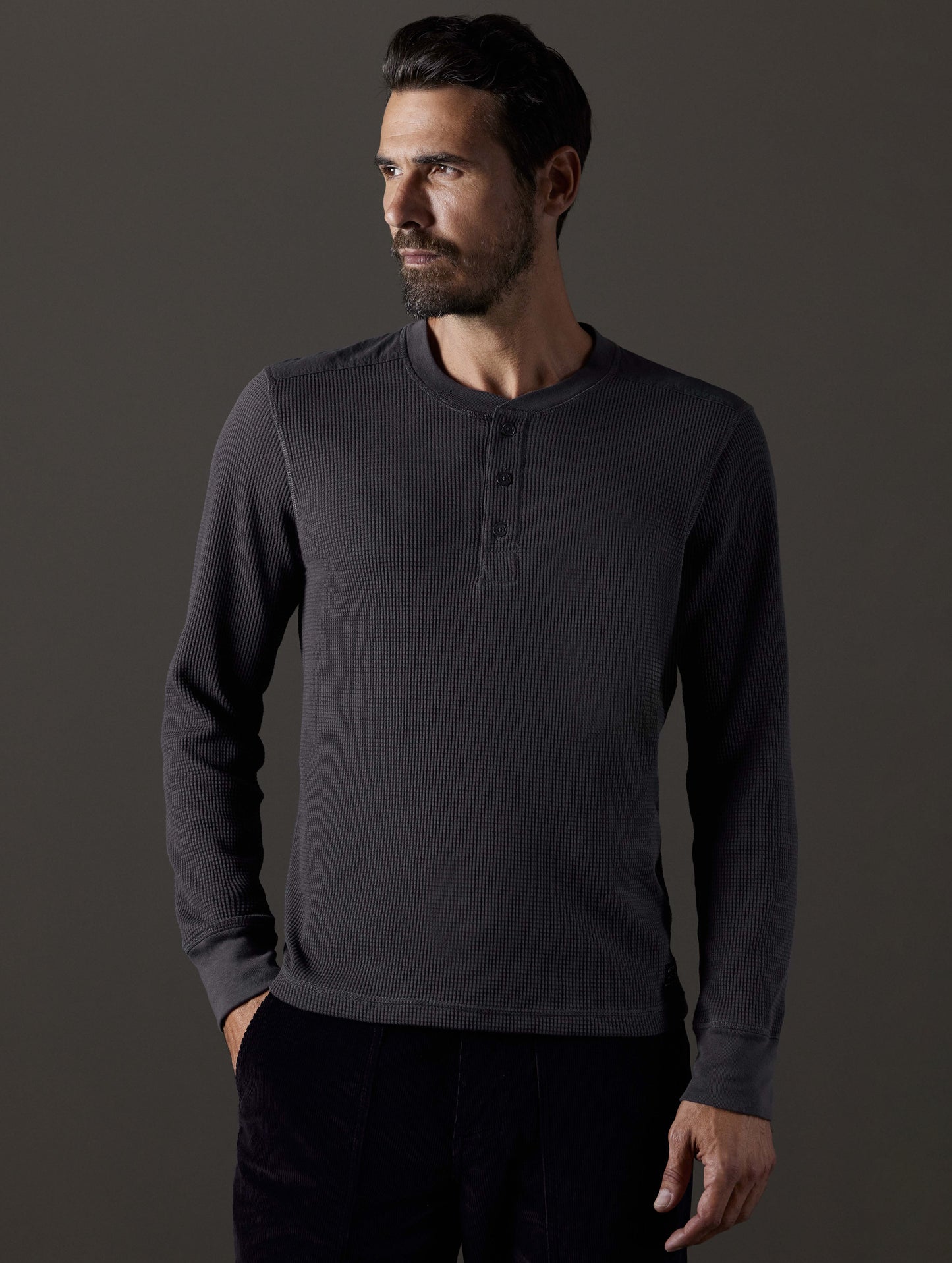 Front body view of man wearing Milford Waffle Henley in Graphite from AETHER Apparel.