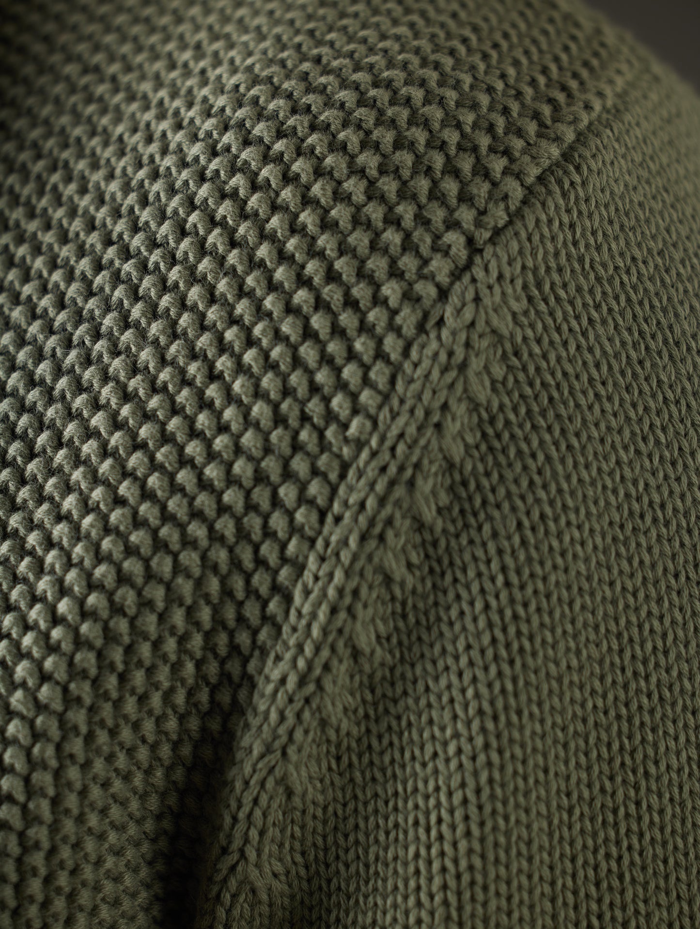 Closeup detailed view of knitted constrution of Oliver Cotton Button-Up Sweater in Fern Green from AETHER Apparel.