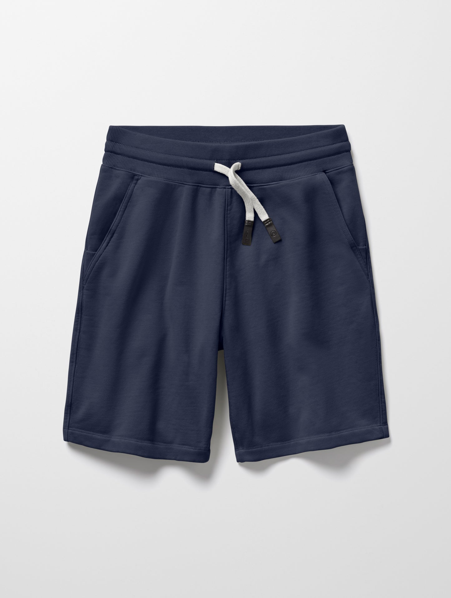 Flat lay of Osa Sweatshort in Total Eclipse dark blue from AETHER Apparel.