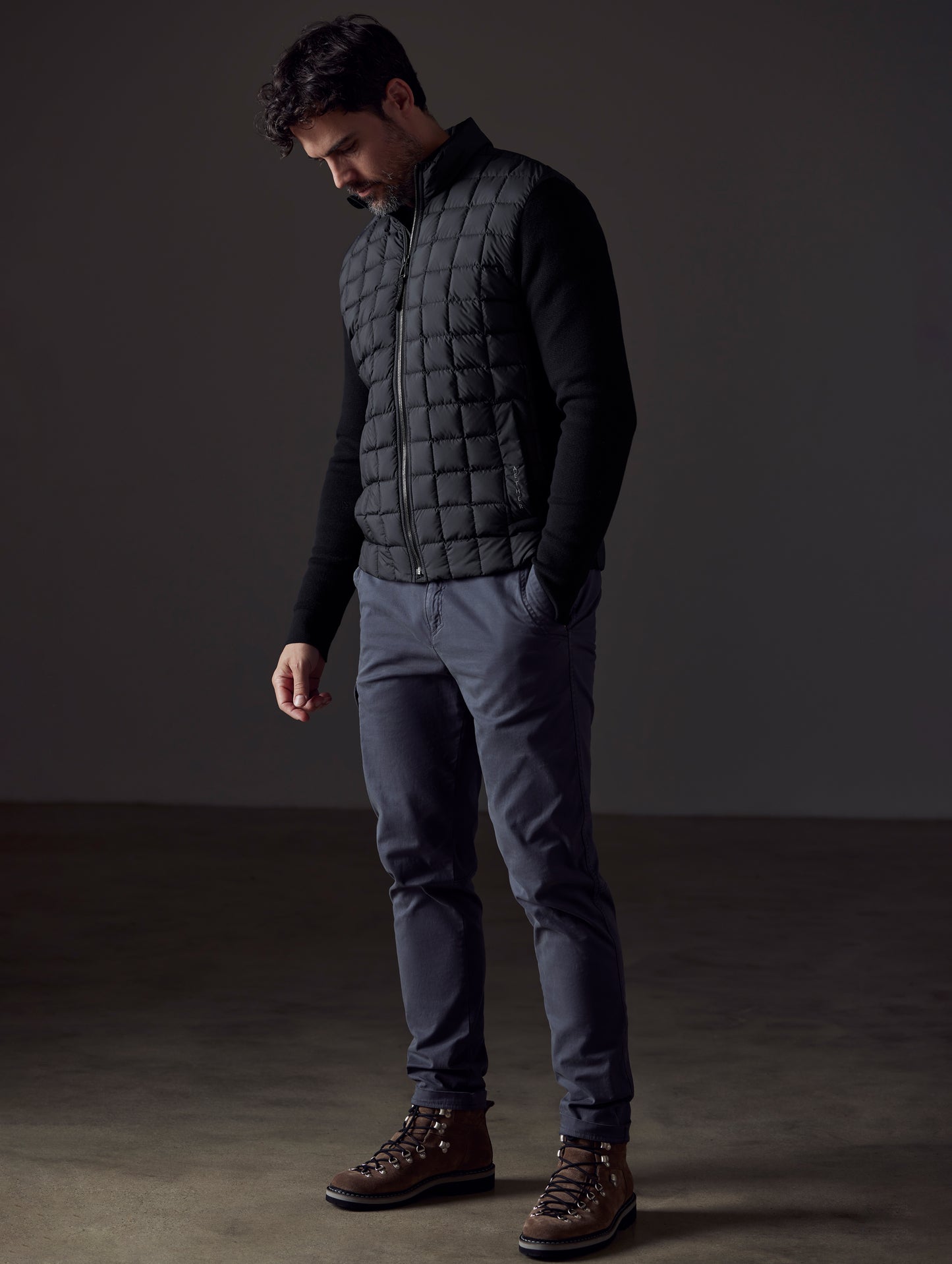 man wearing black insulated jacket from AETHER Apparel