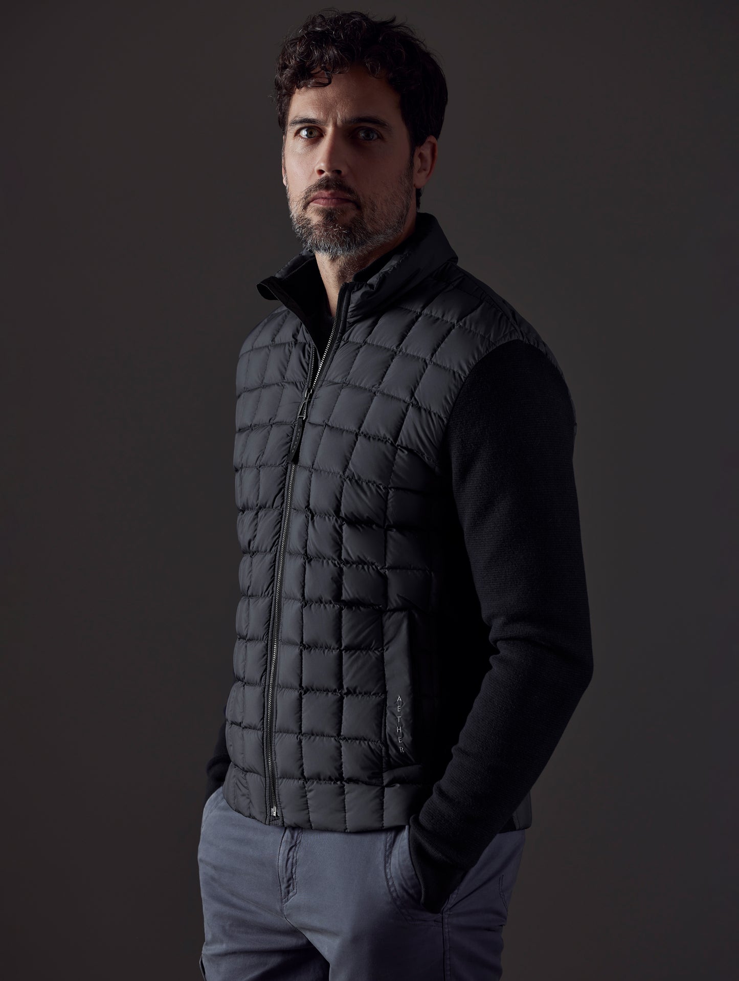 man wearing black insulated jacket from AETHER Apparel
