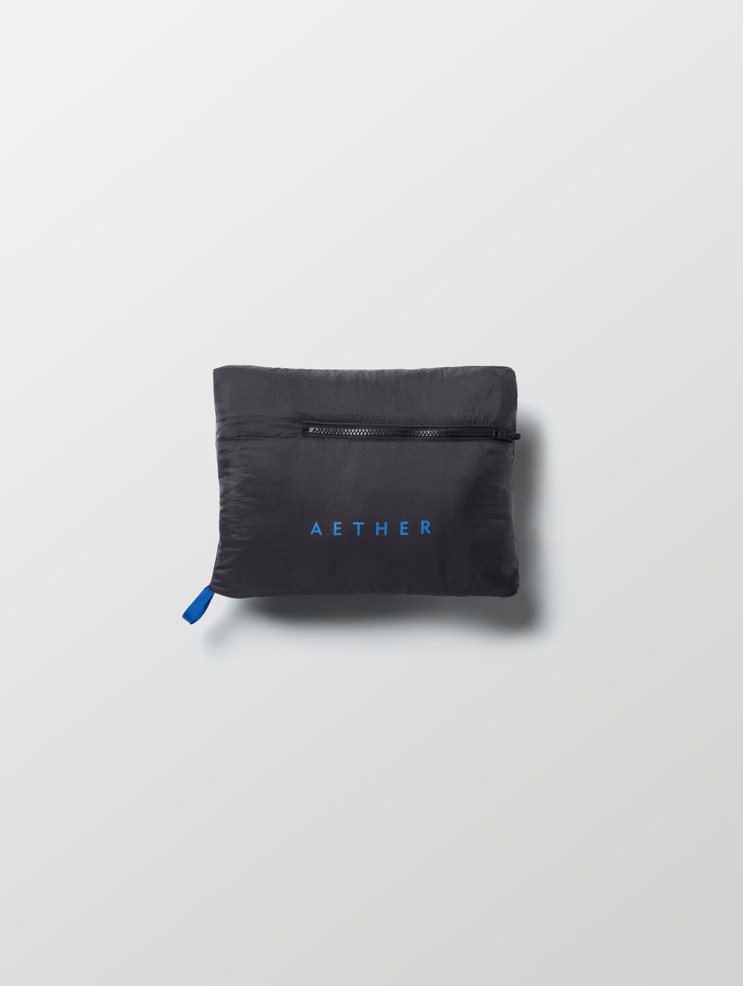 Self-packed Prospect Packable Down Jacket in Onyx Black from AETHER Apparel.