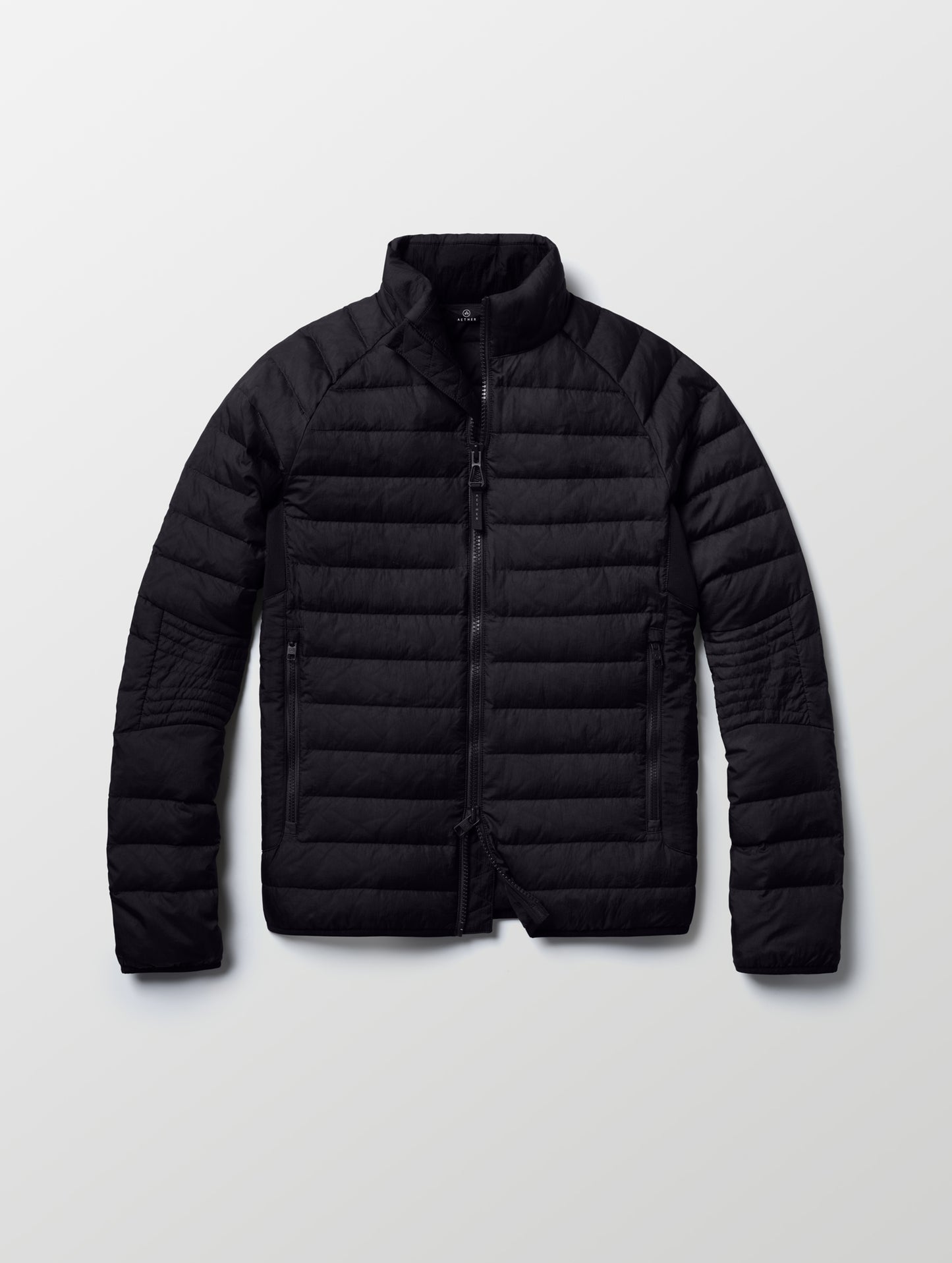 Flat lay of Prospect Packable Down Jacket in Onyx Black from AETHER Apparel.