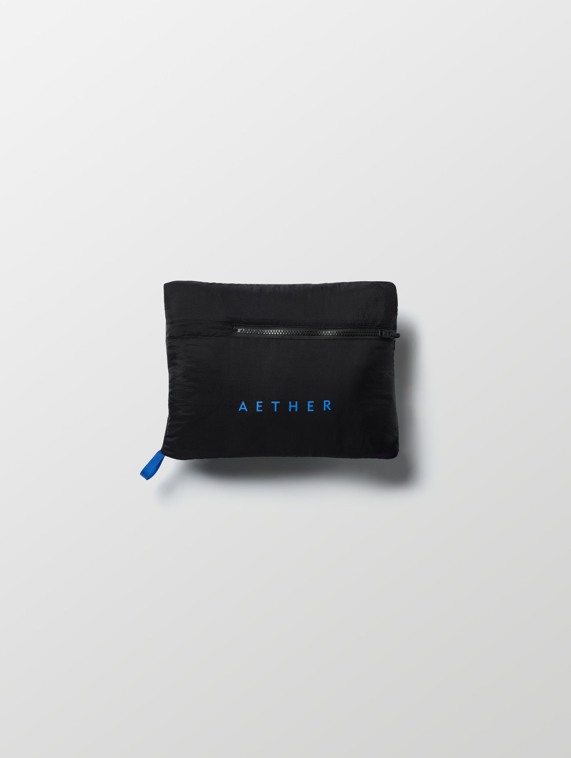 Self-packed Prospect Packable Down Jacket in Onyx Black from AETHER Apparel.