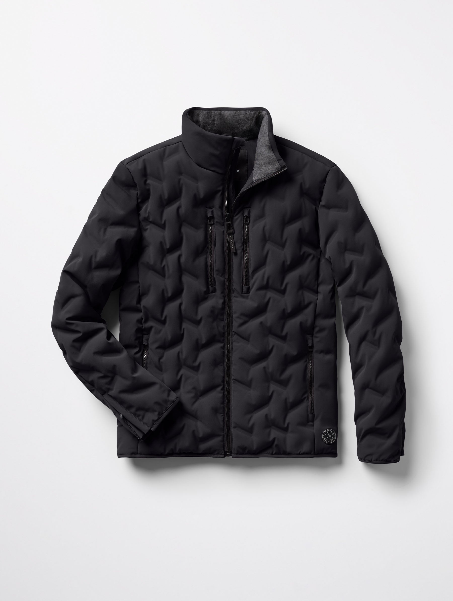Flat lay of the Rex Down Jacket in Onyx Black from AETHER Apparel.