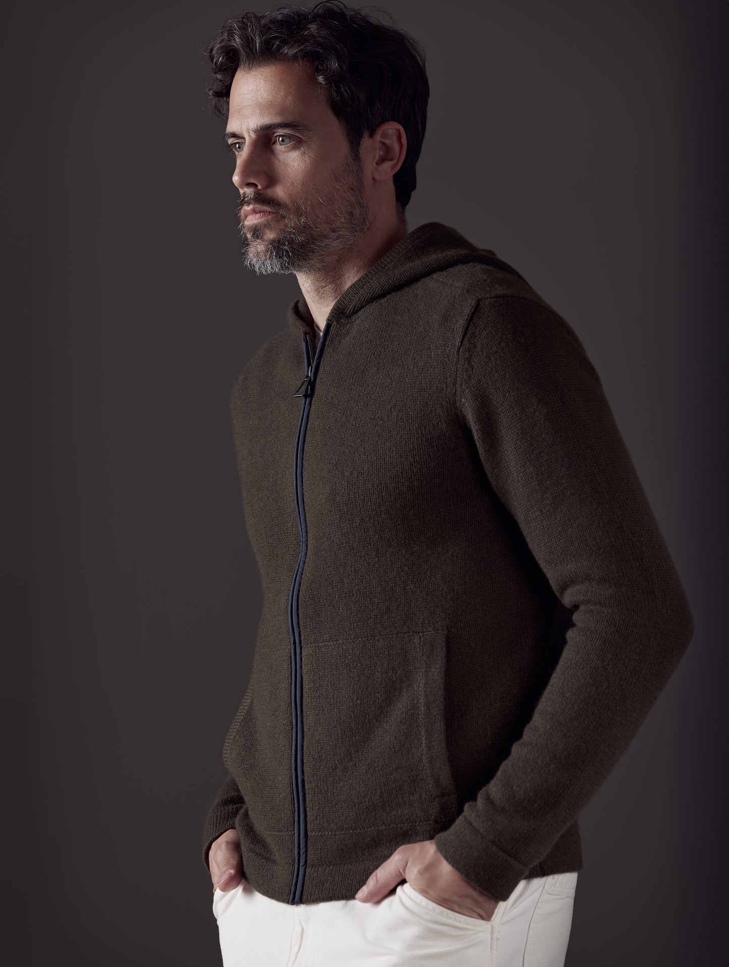 Front 3/4 body view of man wearing Sawyer Cashmere Full-Zip in Command Green from AETHER Apparel.