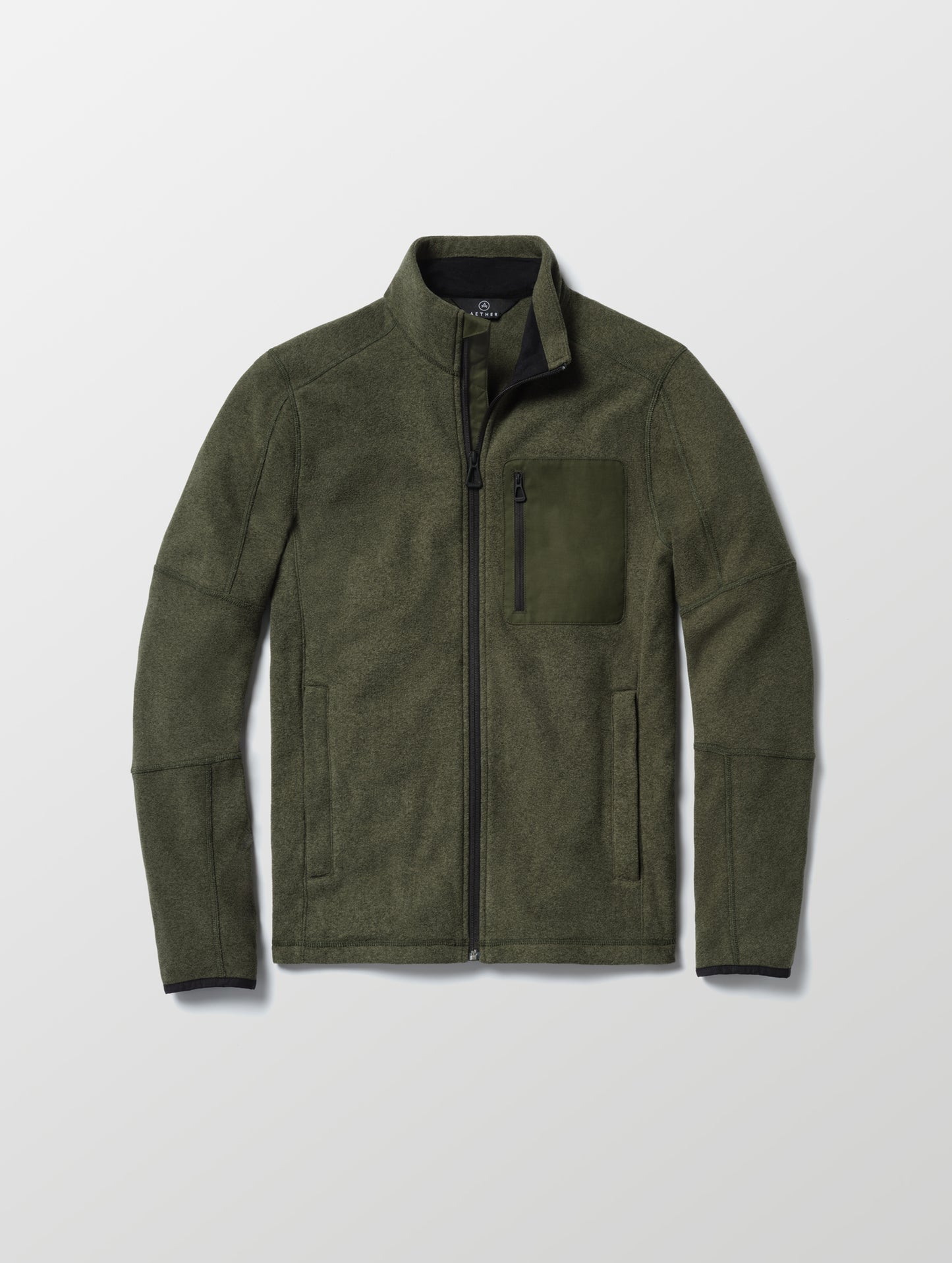 Flay lay of Sutherlin Full-Zip in Forest Green from AETHER Apparel.