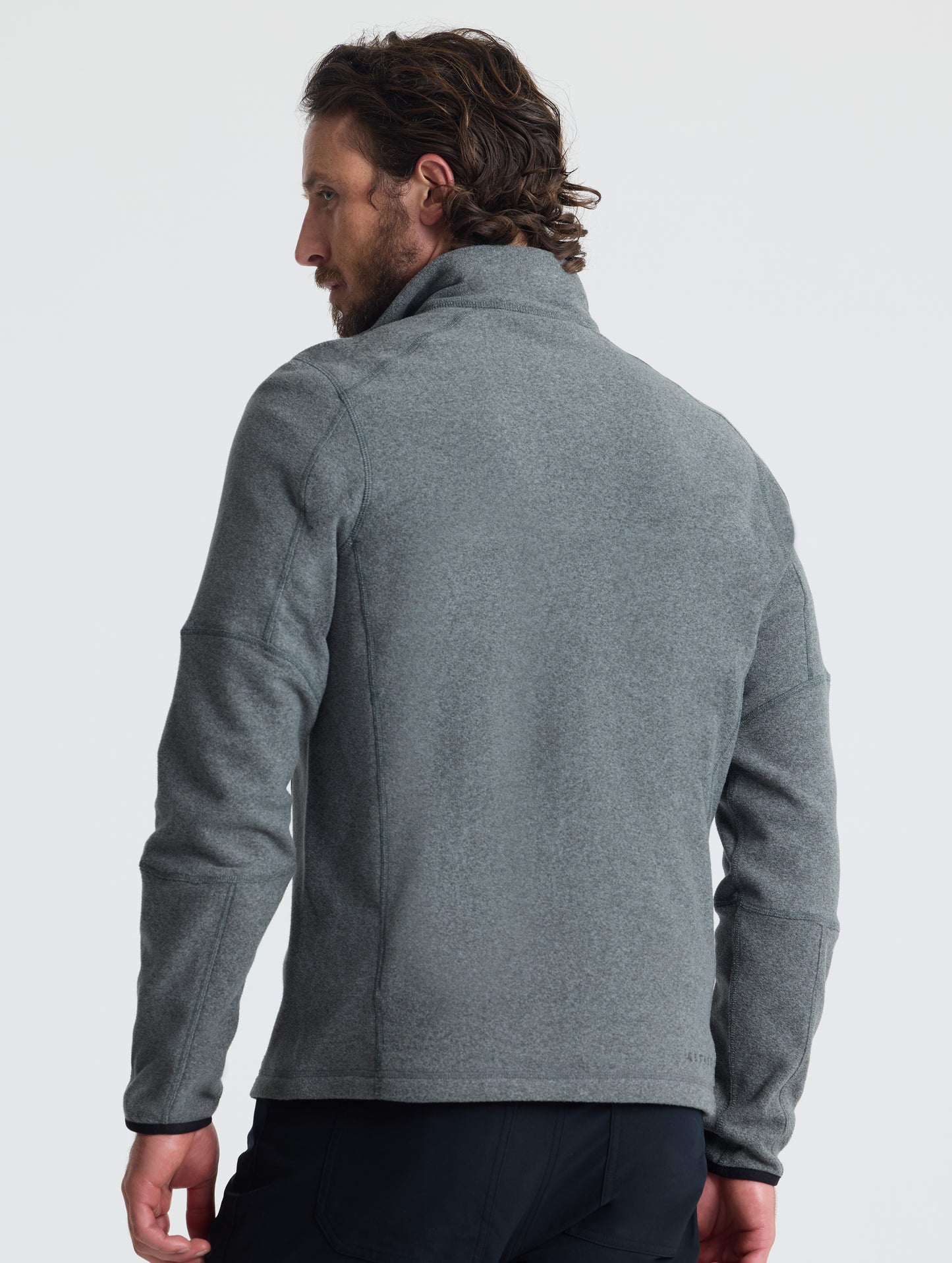 Rear view of man wearing Sutherlin Half-Zip in Charcoal Heather from AETHER Apparel.