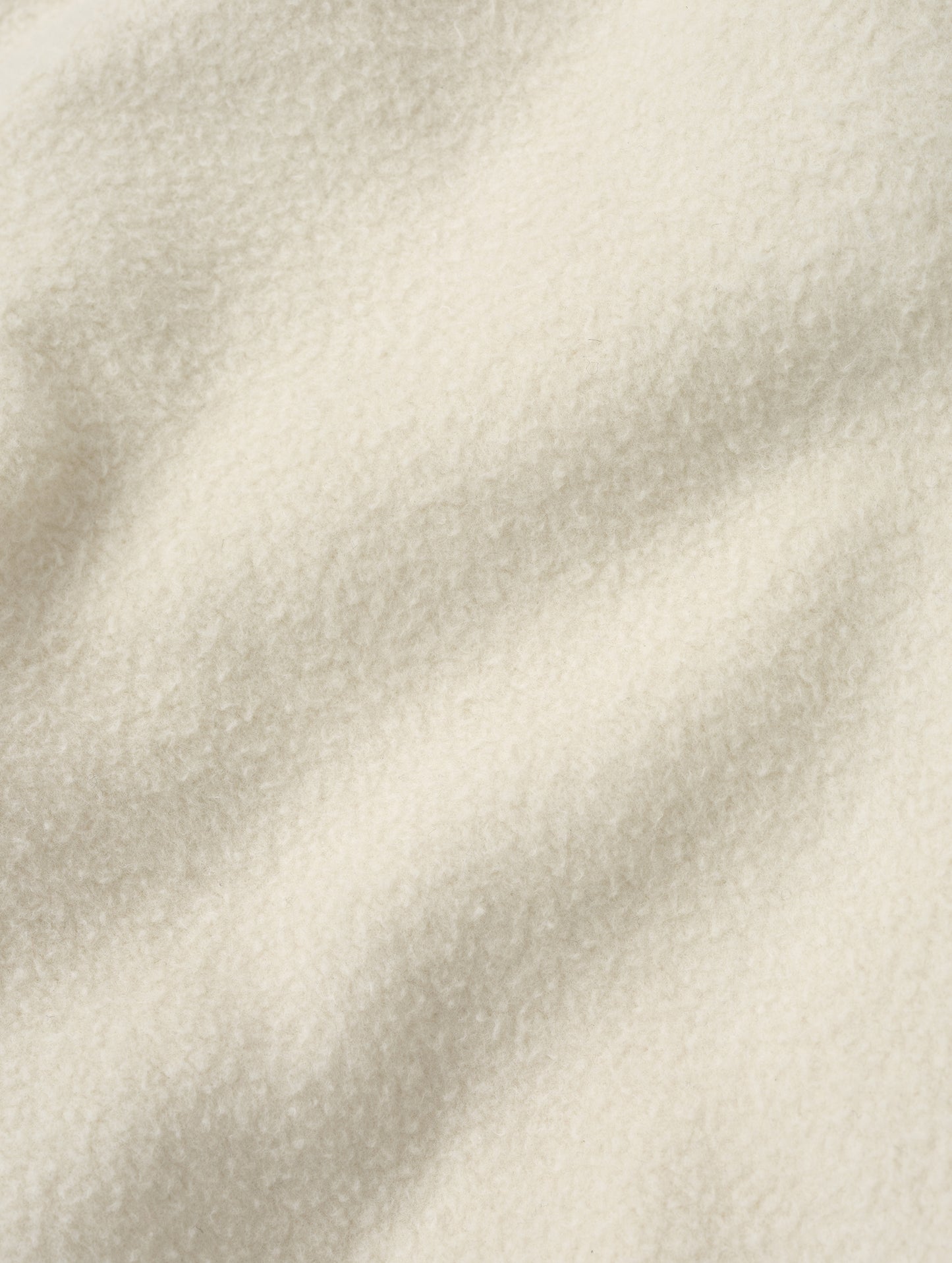 Closeup detailed view of the fabric on the Rylan Cuffed Sweatpant in Bone from AETHER Apparel.