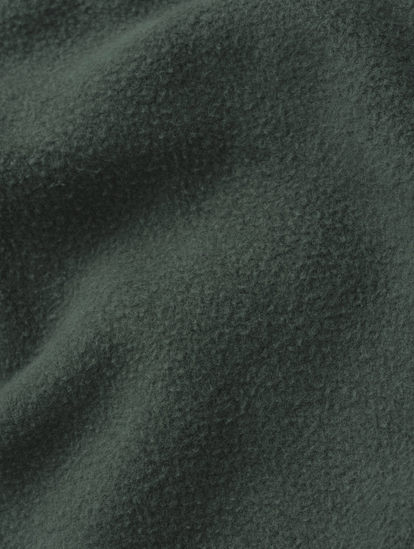 Closeup detailed view of the fabric on the Rylan Cuffed Sweatpant in Saville Green from AETHER Apparel.