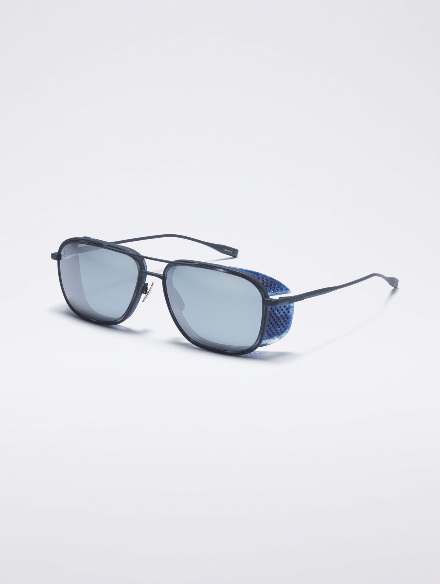 Front 3/4 view of Summit Sunglass in Blue titanium with Blue Lens from AETHER Apparel.