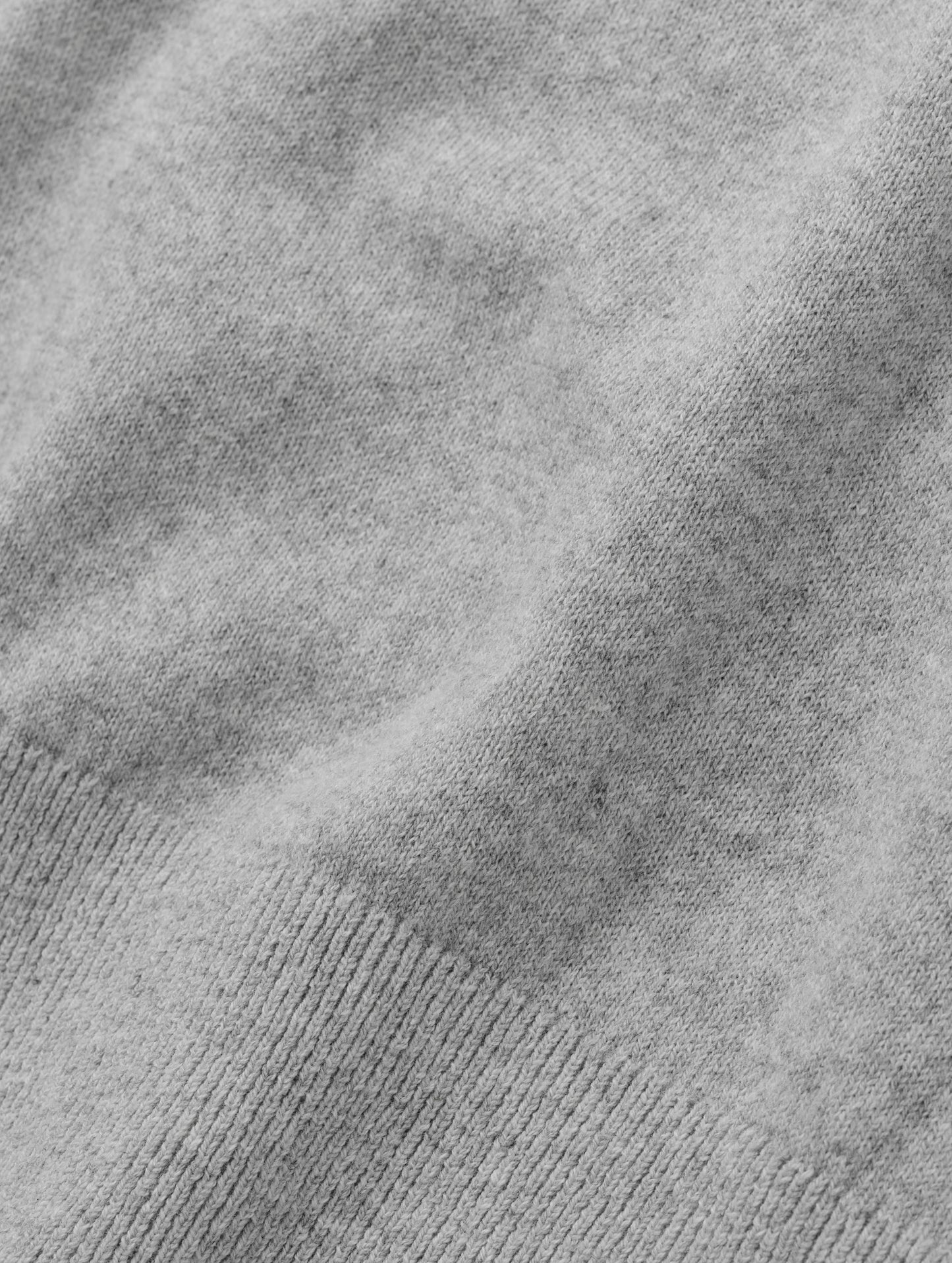 Closeup detailed view of the fabric on the women's Aero Crewneck Sweater 2.0 in Alumino Grey from AETHER Apparel.