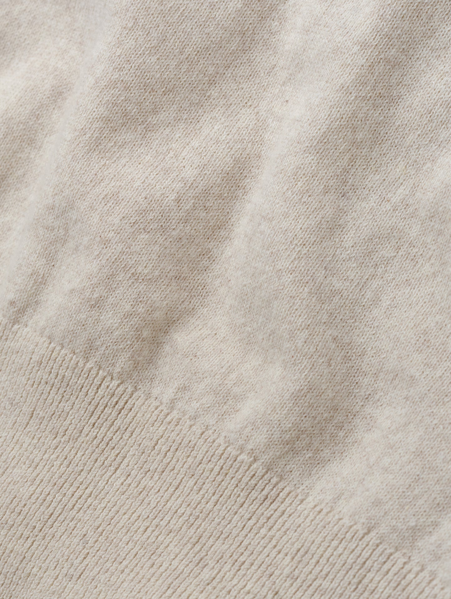 Closeup detailed view of the fabric on the women's Aero Crewneck Sweater 2.0 in Lino Tan from AETHER Apparel.