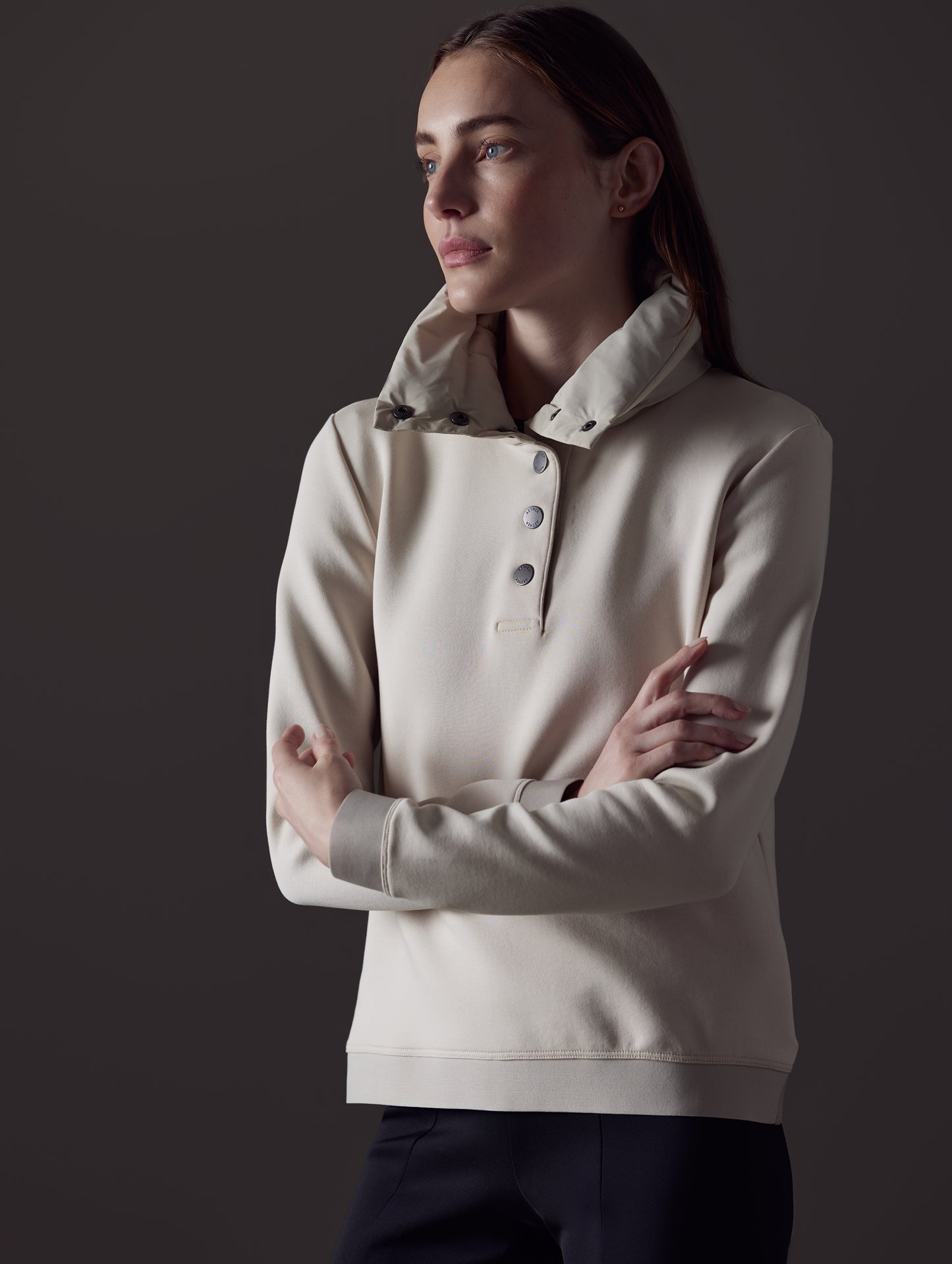 Front angled view of woman wearing Align Pullover in Bone white from AETHER Apparel.