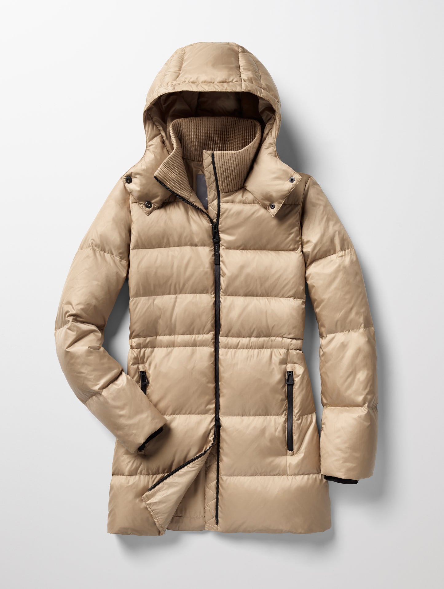 Flat lay of Aura Puffer Long in Chinchilla Brown from AETHER Apparel.