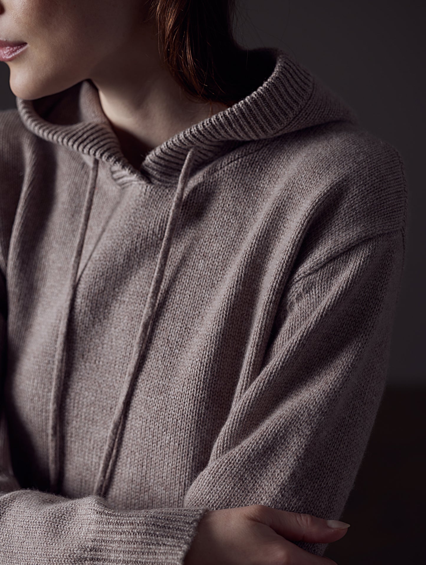 Woman wearing light brown Ava Cashmere Hooded Sweater