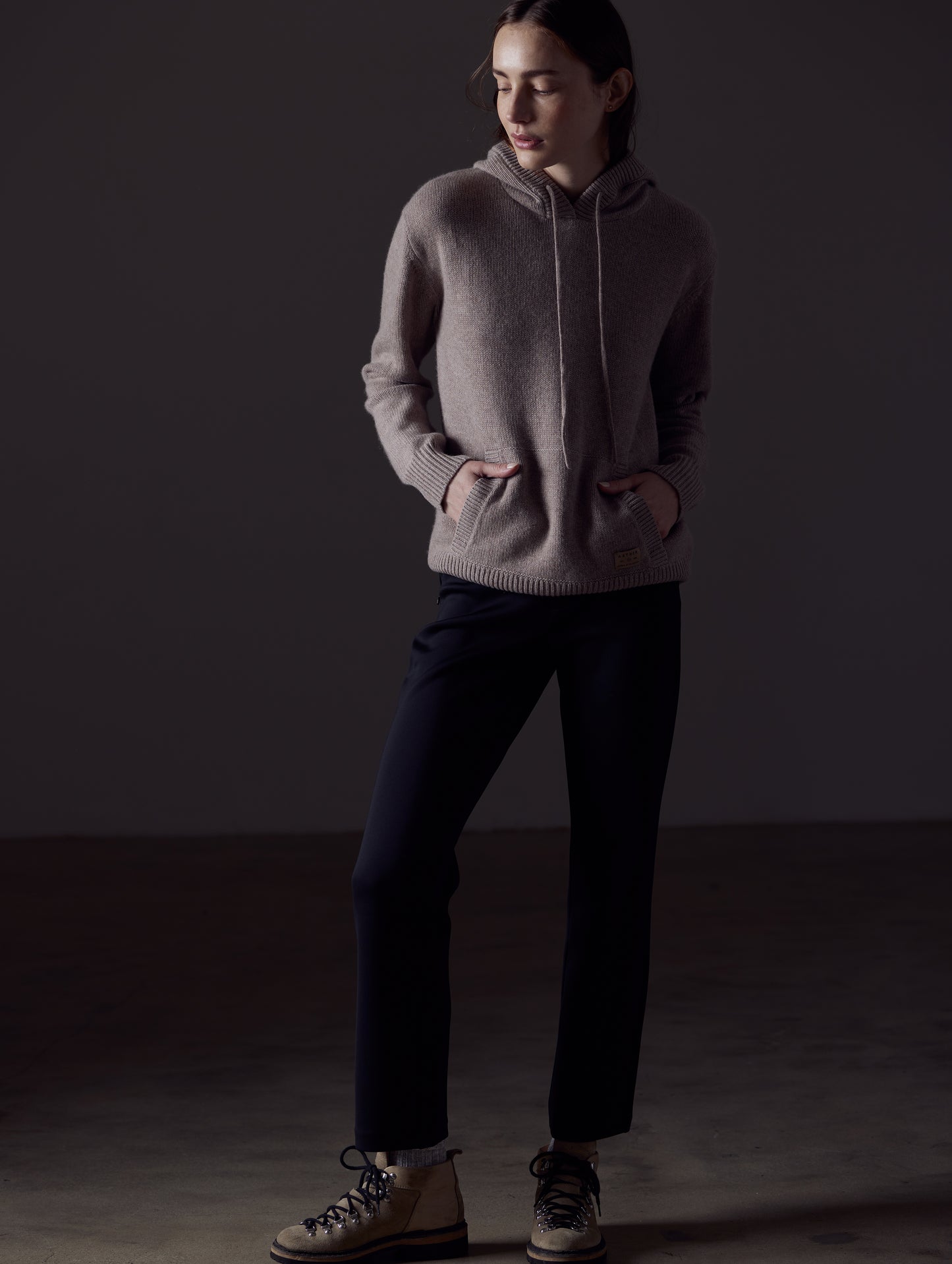 Woman wearing light brown Ava Cashmere Hooded Sweater