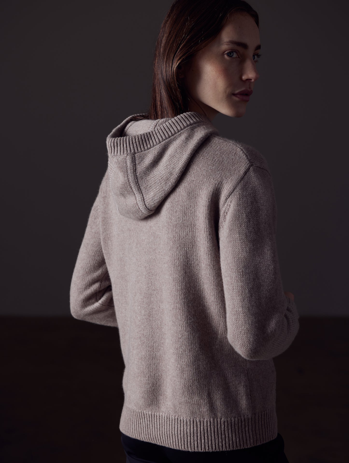 Woman wearing light brown Ava Cashmere Hooded Sweater