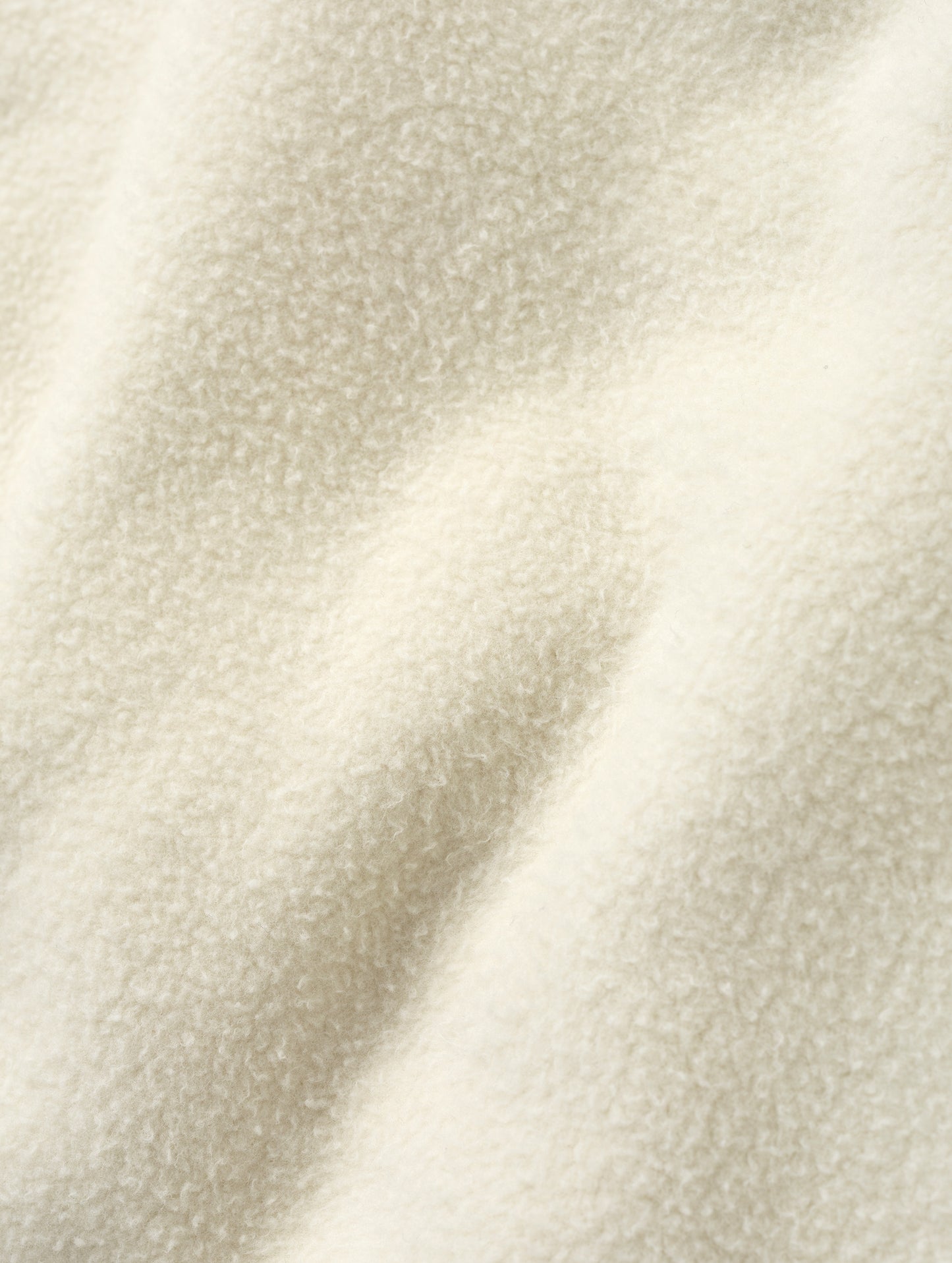 Closeup detailed view of the fabric on the Ayla Crewneck Sweatshirt in Bone from AETHER Apparel.