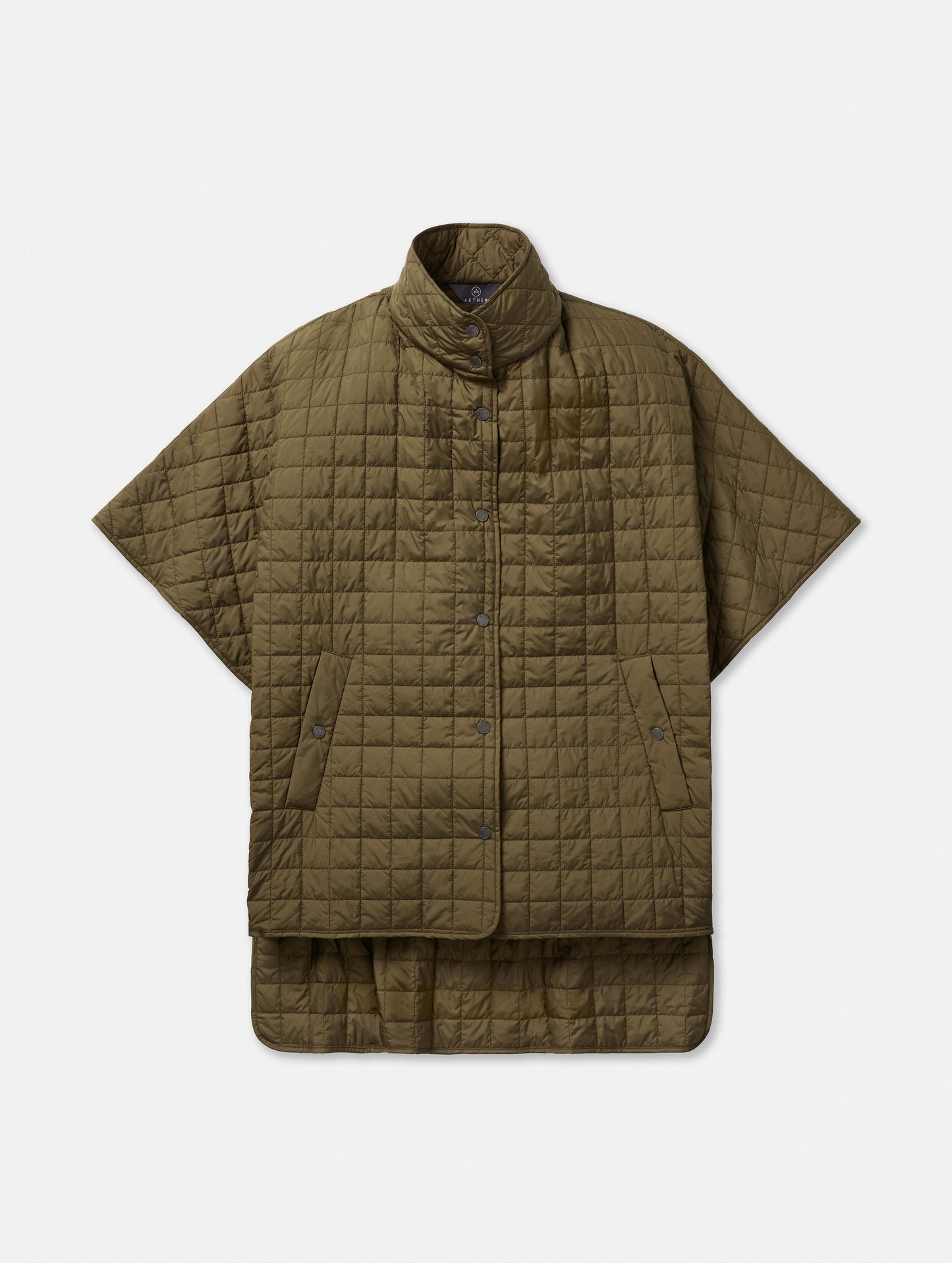 Flat lay of women’s Bardo Poncho Jacket in Command Green from AETHER Apparel.