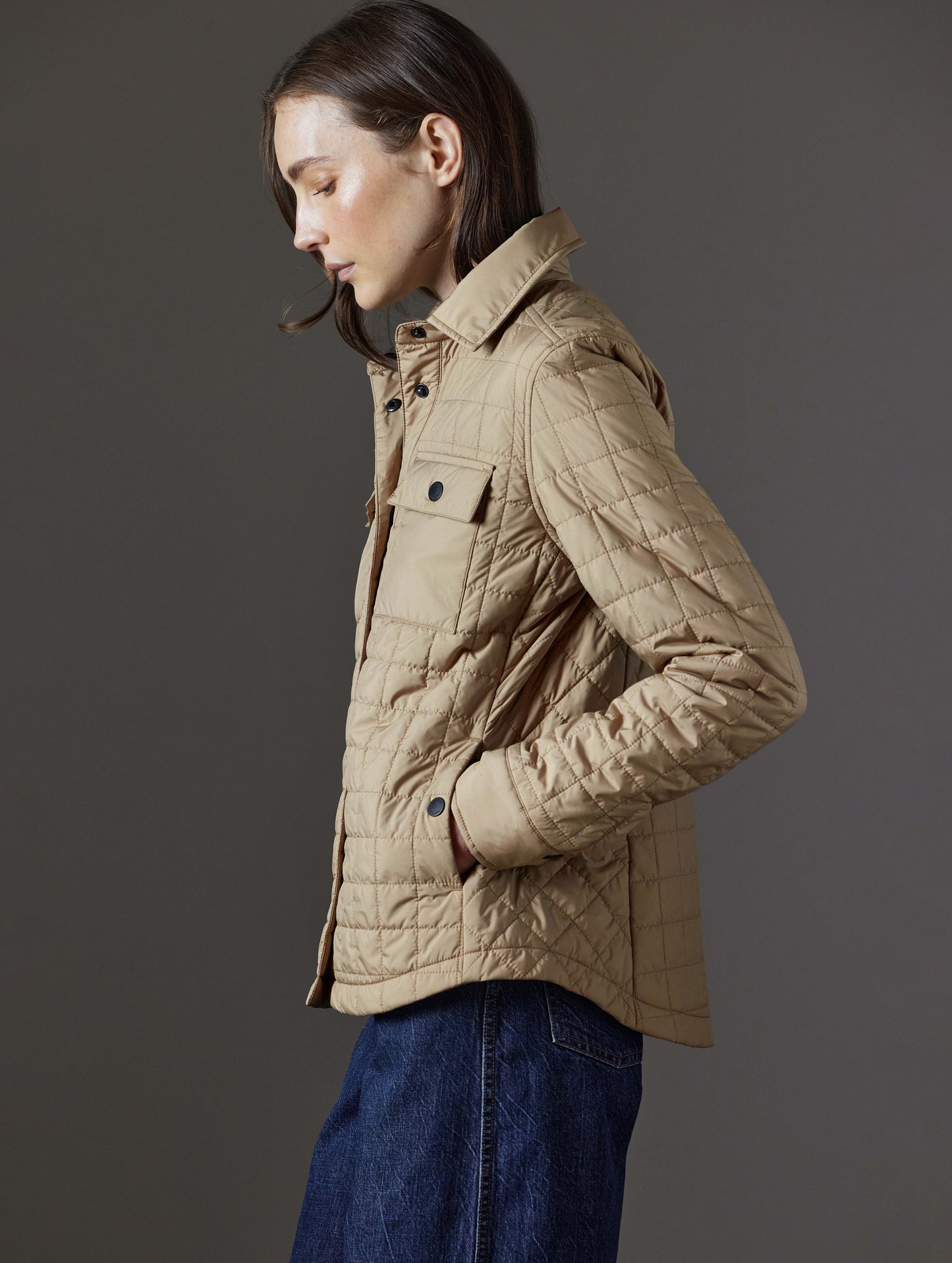 Side profile view of woman wearing Bardo Shirt Jacket in Chinchilla Brown from AETHER Apparel.